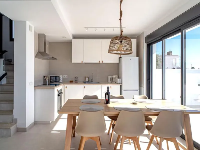 This elegant modern villa blends clean architectural lines with a warm, comfortable feel, set within a quiet residential area just outside Nerja. From its elevated position, the property enjoys spectacular views of both the sea and surrounding mountains.