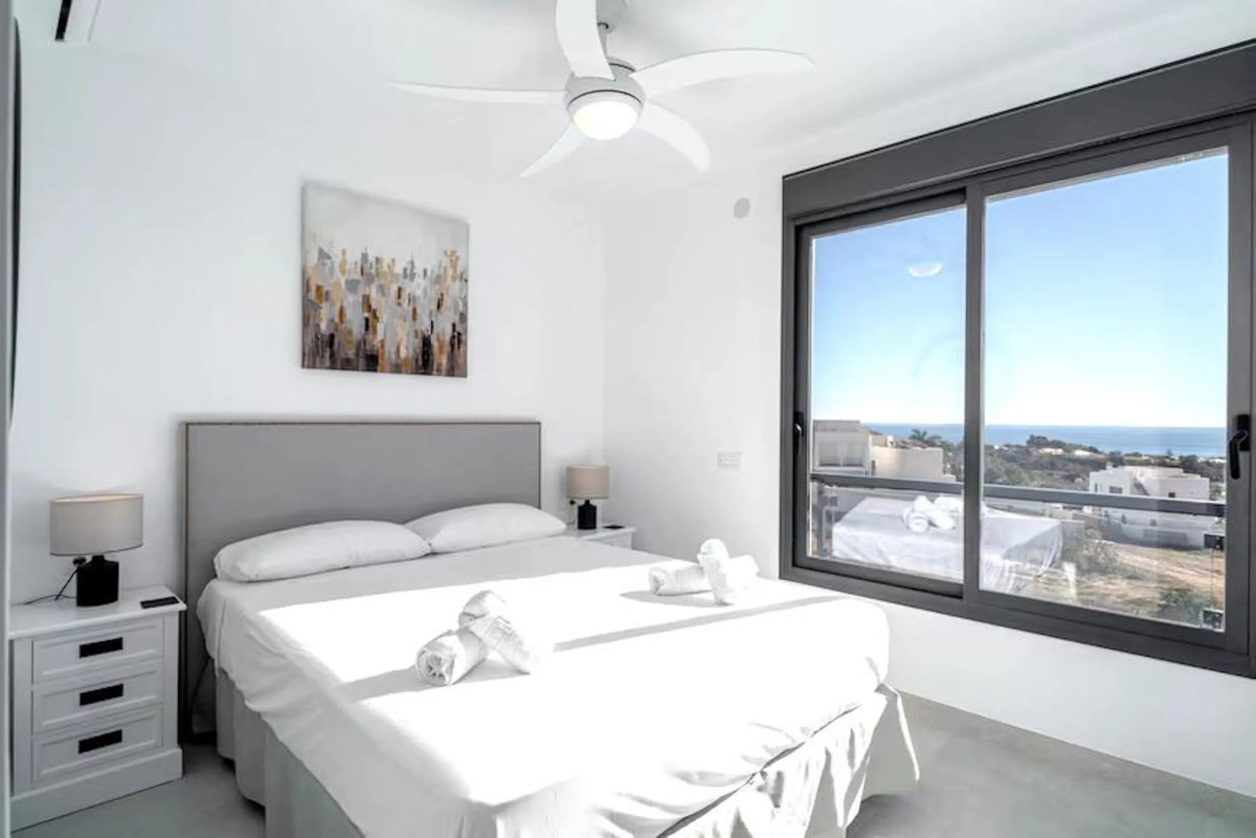 This elegant modern villa blends clean architectural lines with a warm, comfortable feel, set within a quiet residential area just outside Nerja. From its elevated position, the property enjoys spectacular views of both the sea and surrounding mountains.