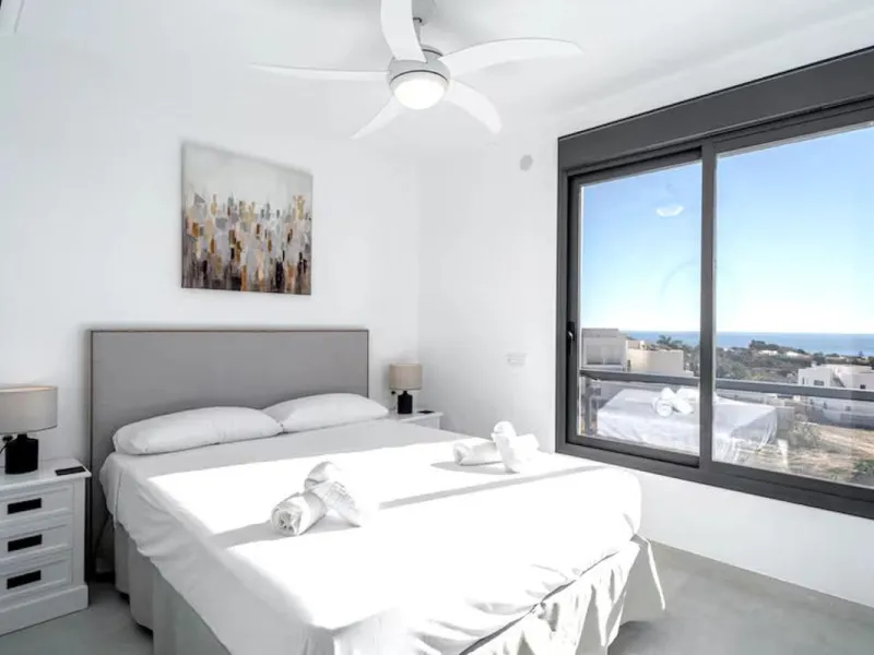 This elegant modern villa blends clean architectural lines with a warm, comfortable feel, set within a quiet residential area just outside Nerja. From its elevated position, the property enjoys spectacular views of both the sea and surrounding mountains.