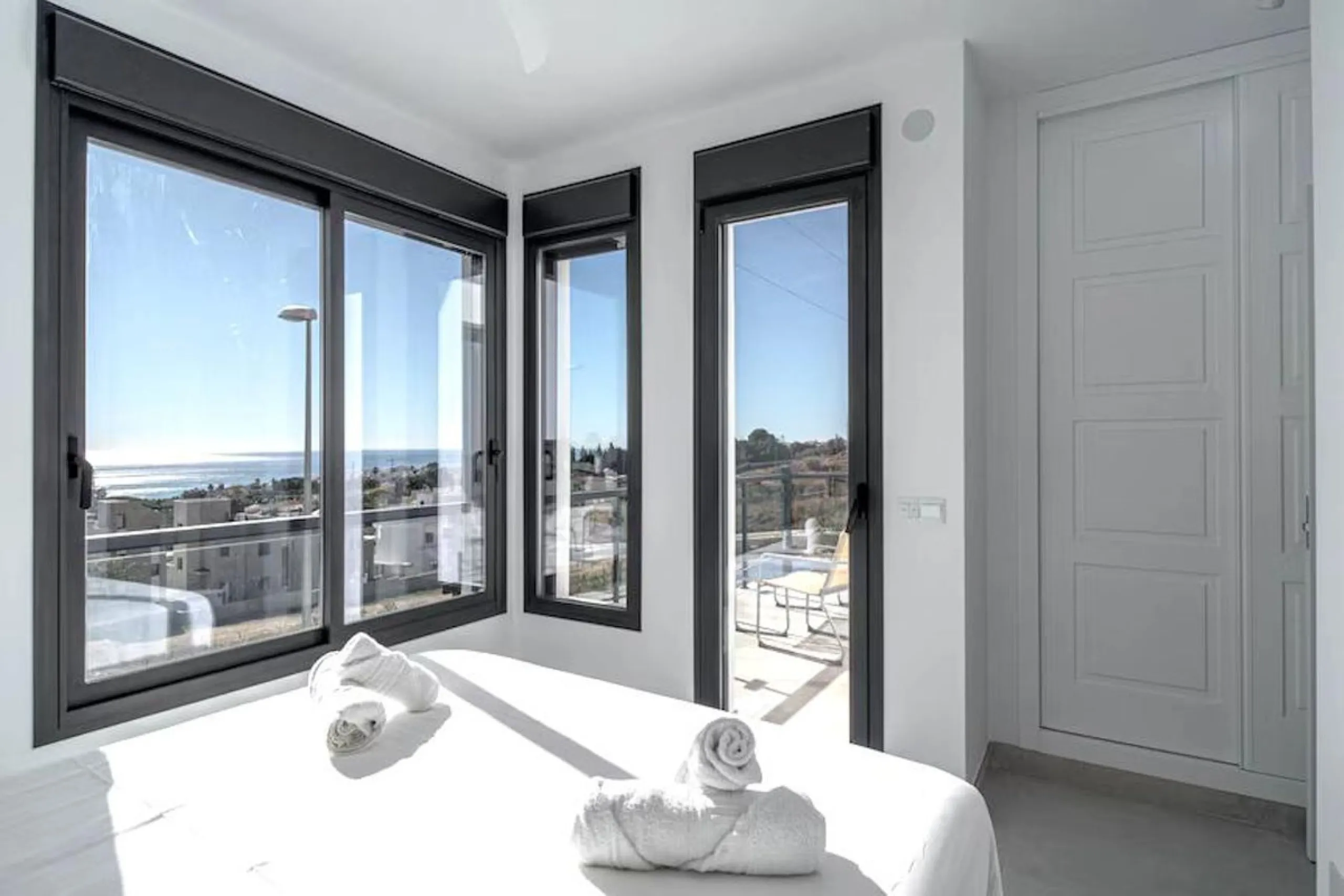 This elegant modern villa blends clean architectural lines with a warm, comfortable feel, set within a quiet residential area just outside Nerja. From its elevated position, the property enjoys spectacular views of both the sea and surrounding mountains.