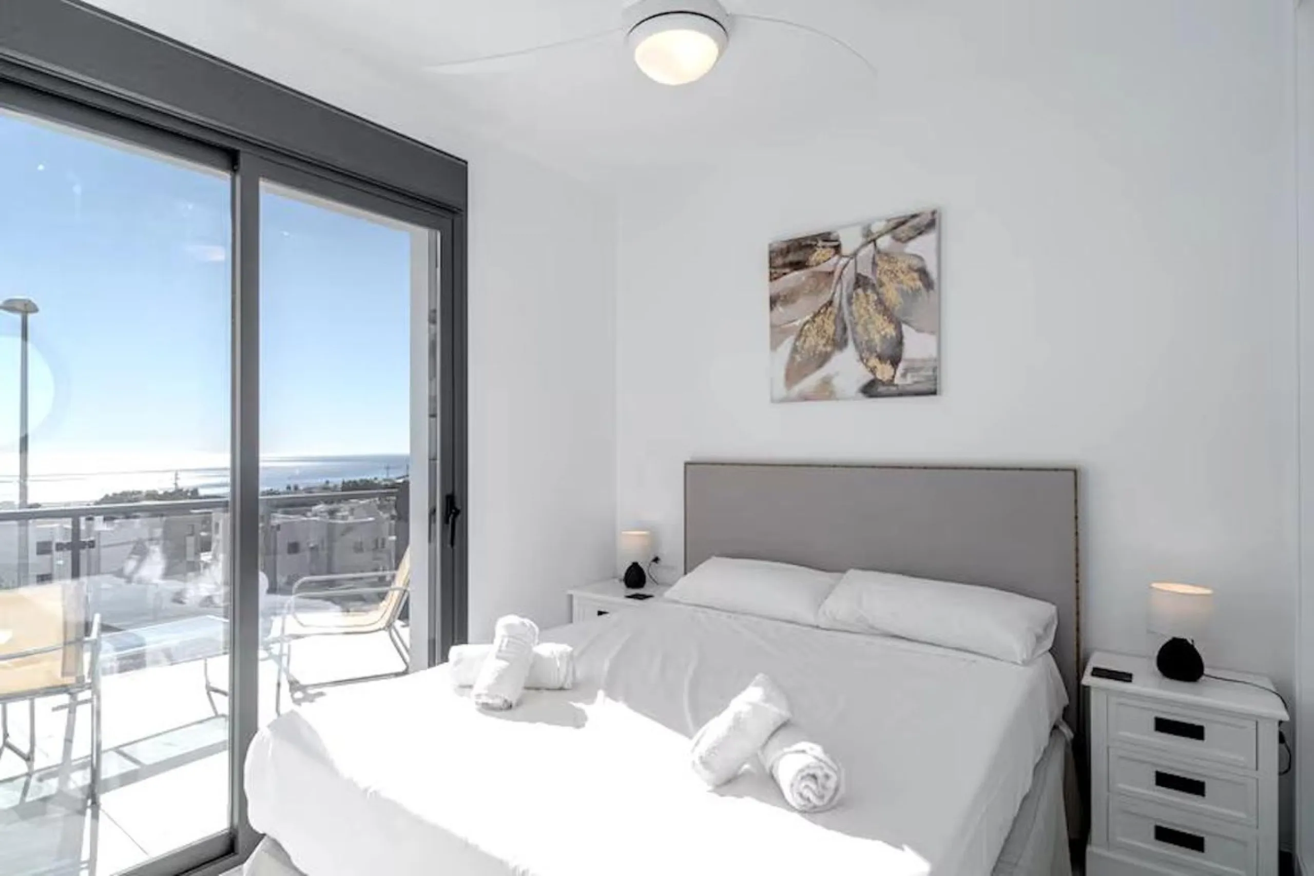This elegant modern villa blends clean architectural lines with a warm, comfortable feel, set within a quiet residential area just outside Nerja. From its elevated position, the property enjoys spectacular views of both the sea and surrounding mountains.