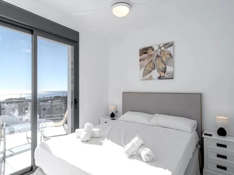 This elegant modern villa blends clean architectural lines with a warm, comfortable feel, set within a quiet residential area just outside Nerja. From its elevated position, the property enjoys spectacular views of both the sea and surrounding mountains.