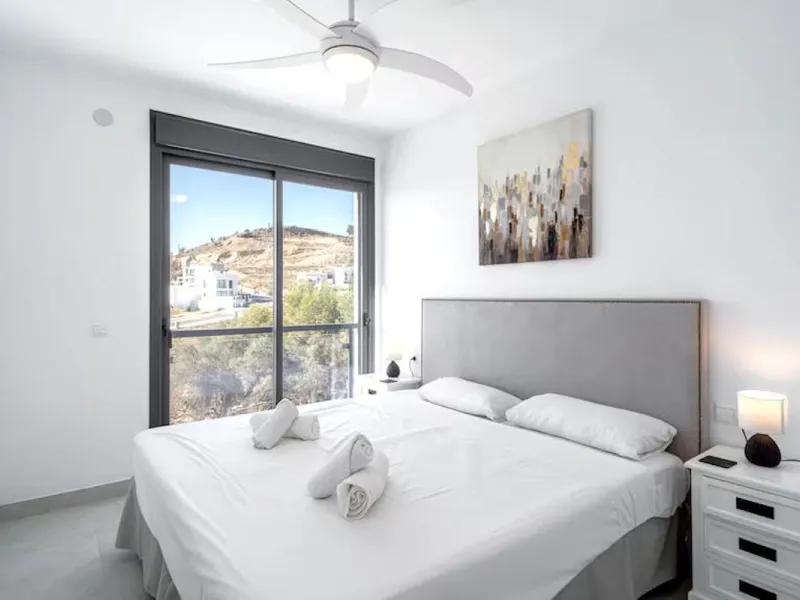 This elegant modern villa blends clean architectural lines with a warm, comfortable feel, set within a quiet residential area just outside Nerja. From its elevated position, the property enjoys spectacular views of both the sea and surrounding mountains.