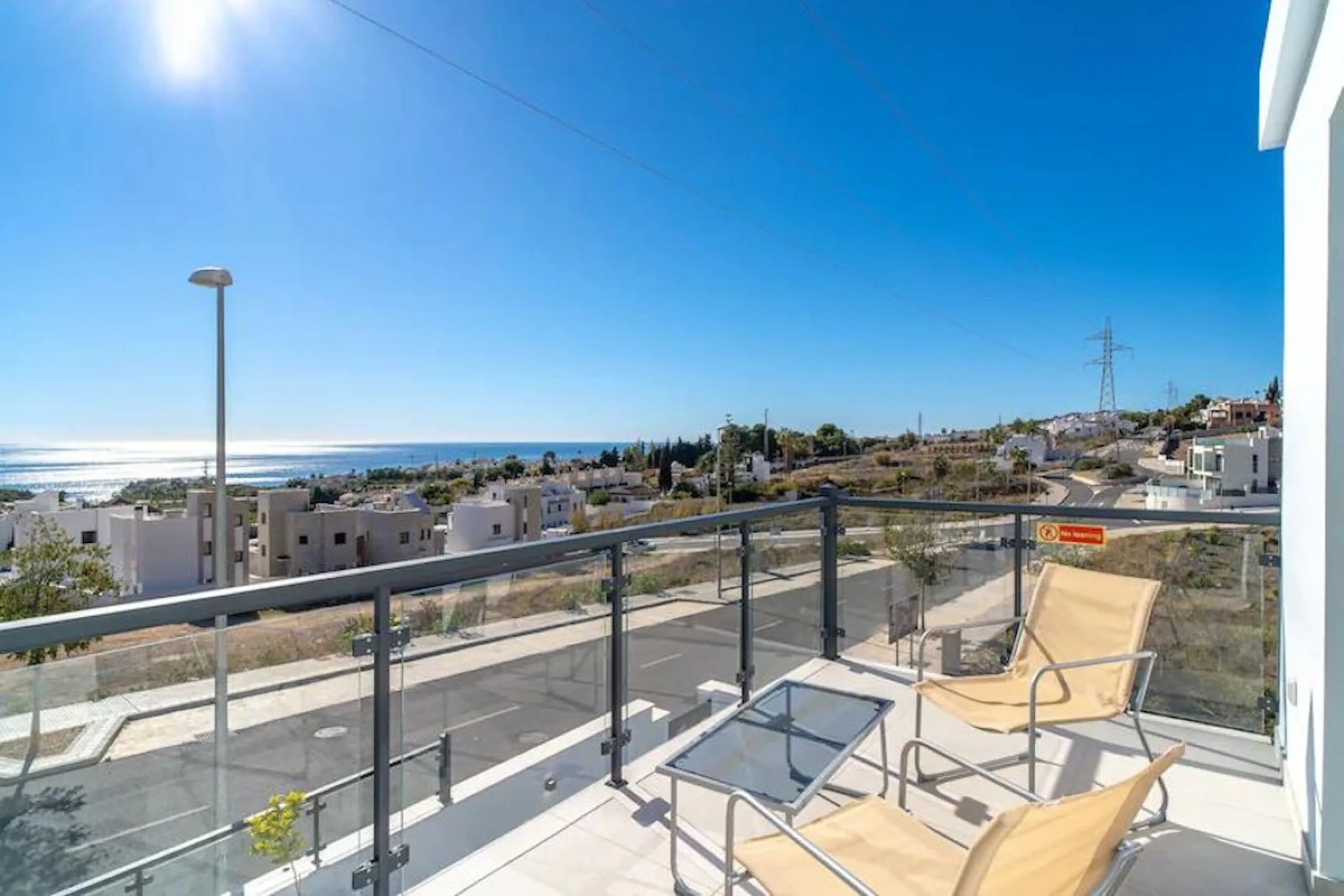 This elegant modern villa blends clean architectural lines with a warm, comfortable feel, set within a quiet residential area just outside Nerja. From its elevated position, the property enjoys spectacular views of both the sea and surrounding mountains.