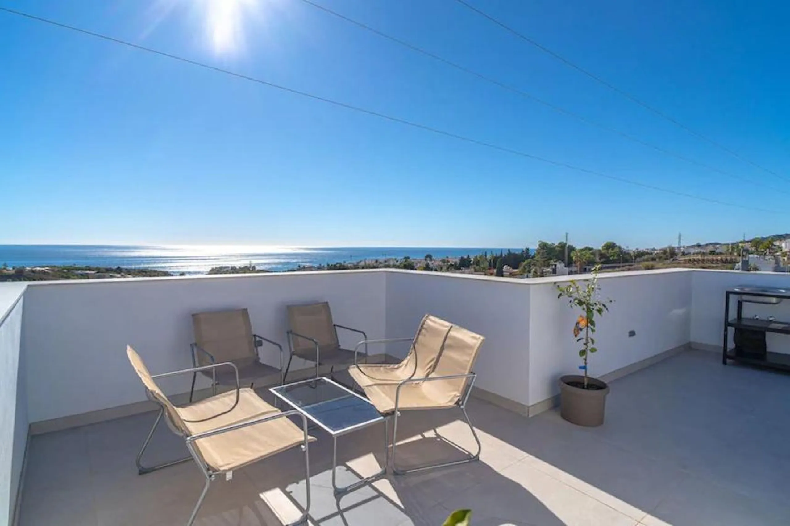 This elegant modern villa blends clean architectural lines with a warm, comfortable feel, set within a quiet residential area just outside Nerja. From its elevated position, the property enjoys spectacular views of both the sea and surrounding mountains.