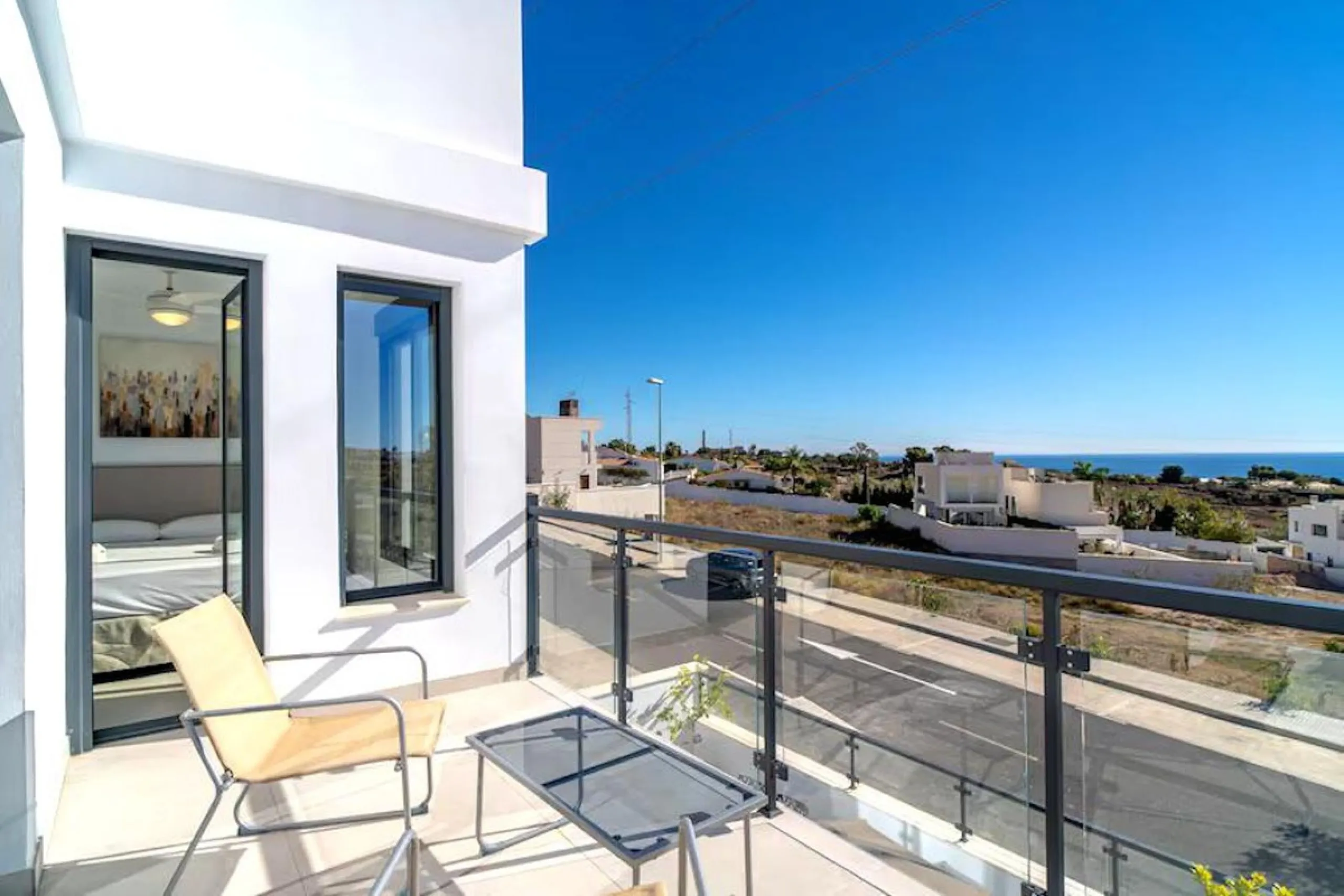 This elegant modern villa blends clean architectural lines with a warm, comfortable feel, set within a quiet residential area just outside Nerja. From its elevated position, the property enjoys spectacular views of both the sea and surrounding mountains.