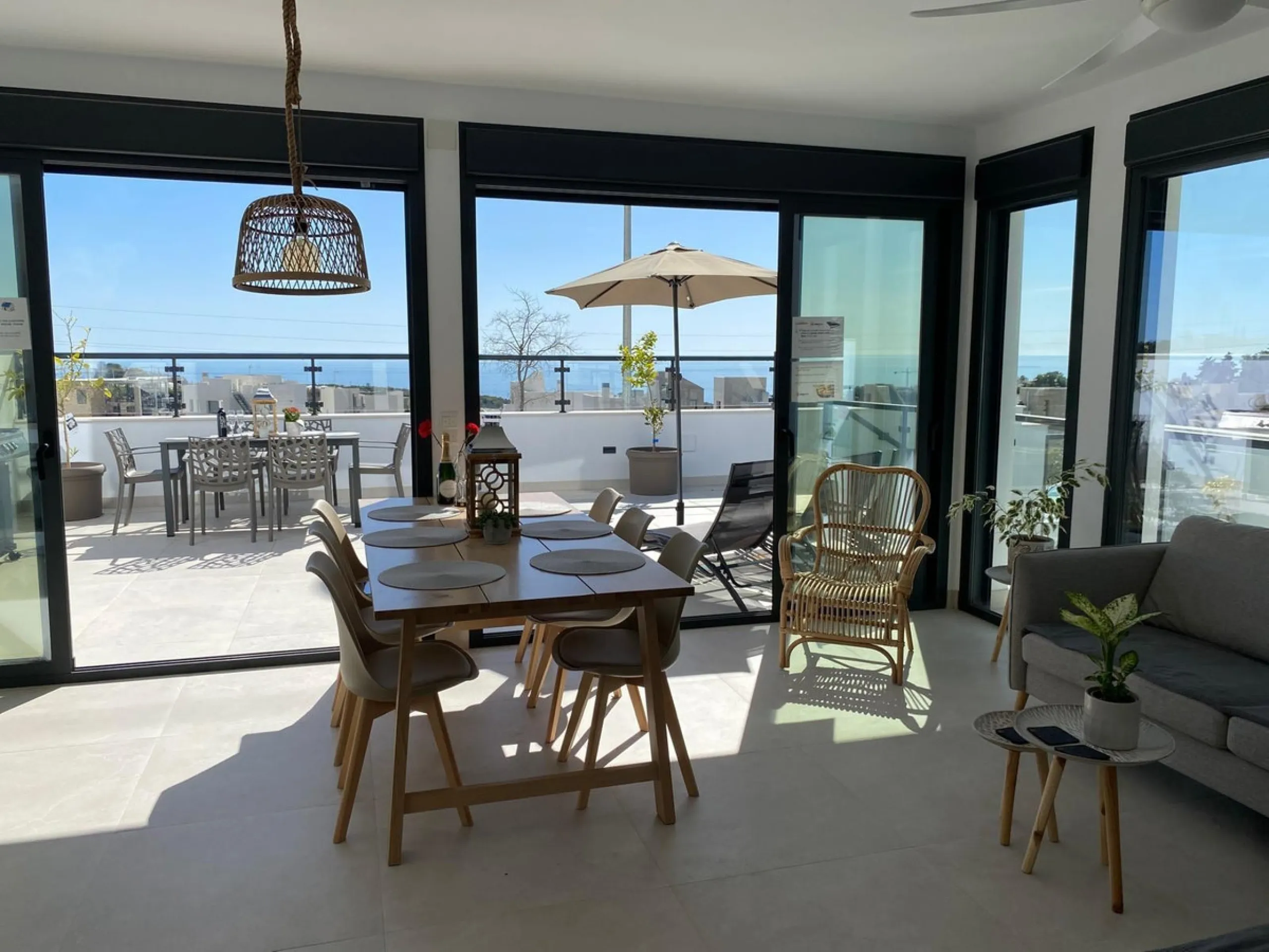 This elegant modern villa blends clean architectural lines with a warm, comfortable feel, set within a quiet residential area just outside Nerja. From its elevated position, the property enjoys spectacular views of both the sea and surrounding mountains.