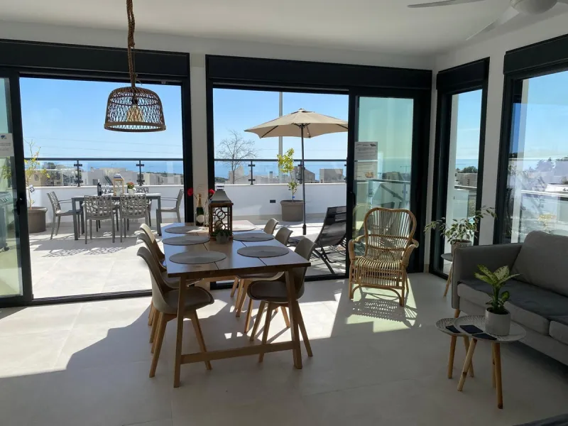 This elegant modern villa blends clean architectural lines with a warm, comfortable feel, set within a quiet residential area just outside Nerja. From its elevated position, the property enjoys spectacular views of both the sea and surrounding mountains.