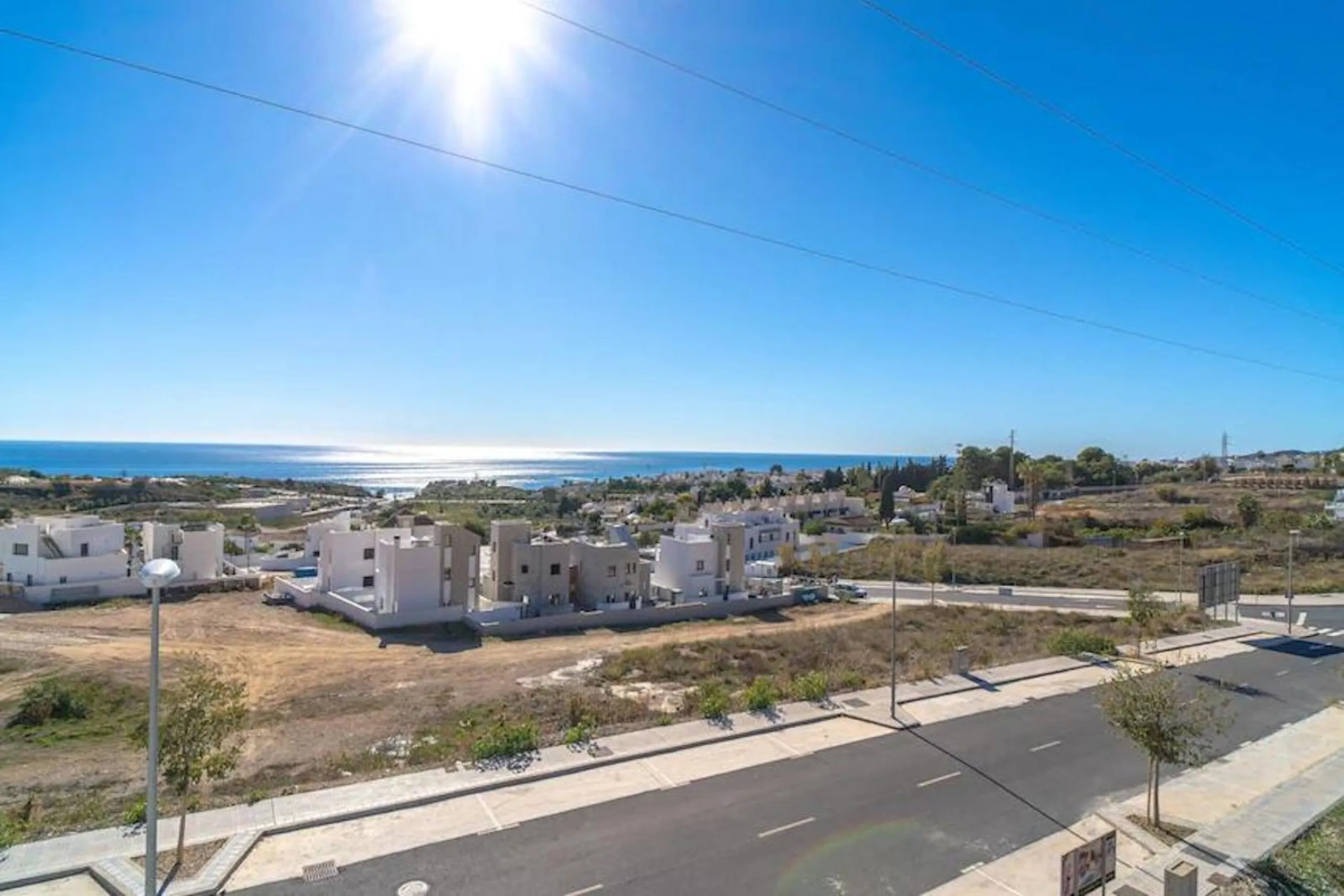 This elegant modern villa blends clean architectural lines with a warm, comfortable feel, set within a quiet residential area just outside Nerja. From its elevated position, the property enjoys spectacular views of both the sea and surrounding mountains.