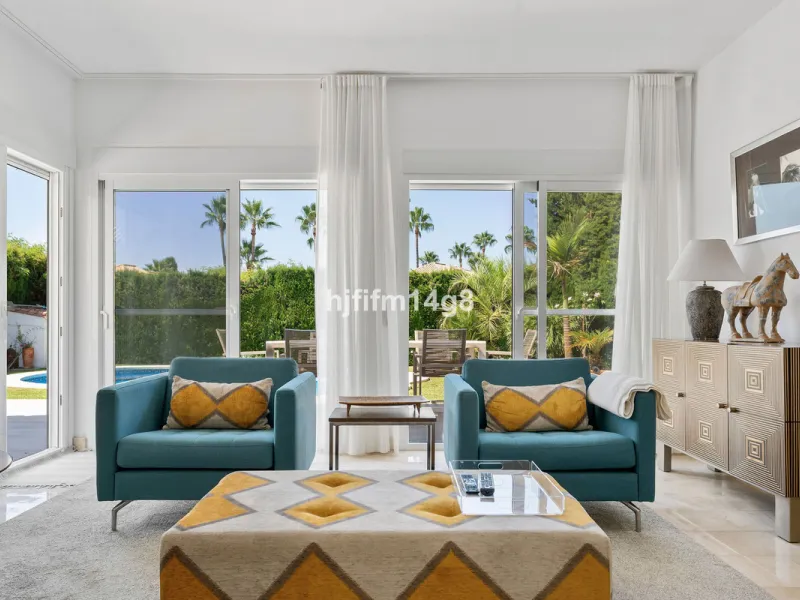 This charming villa is tucked away in a peaceful cul-de-sac within the exclusive gated community of Marbella Country Club, one of Nueva Andalucía's most desirable residential areas. Set on a flat and private south-facing plot, the property offers a perfec