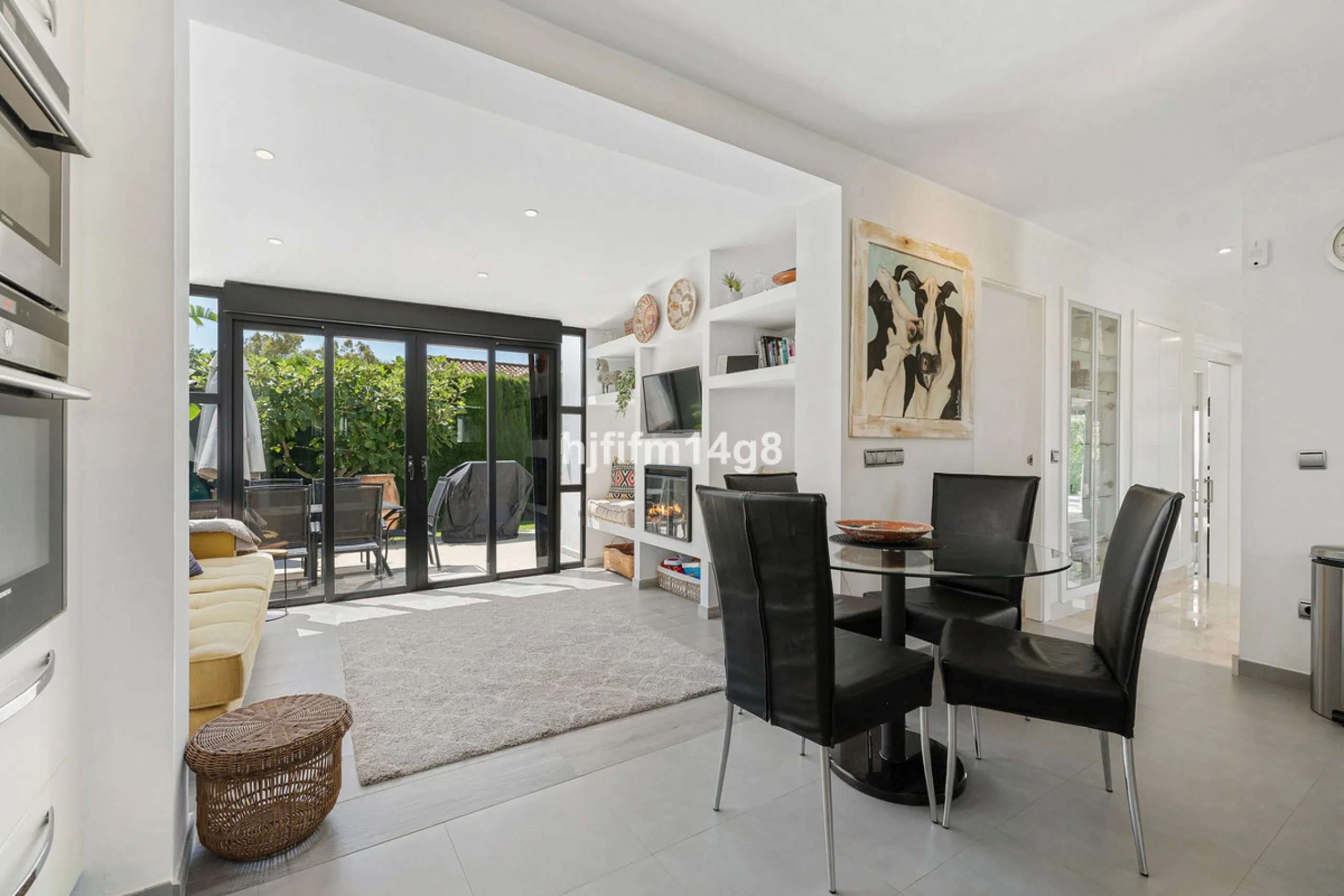 This charming villa is tucked away in a peaceful cul-de-sac within the exclusive gated community of Marbella Country Club, one of Nueva Andalucía's most desirable residential areas. Set on a flat and private south-facing plot, the property offers a perfec