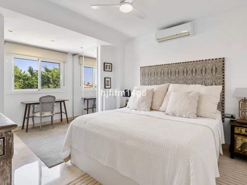 This charming villa is tucked away in a peaceful cul-de-sac within the exclusive gated community of Marbella Country Club, one of Nueva Andalucía's most desirable residential areas. Set on a flat and private south-facing plot, the property offers a perfec