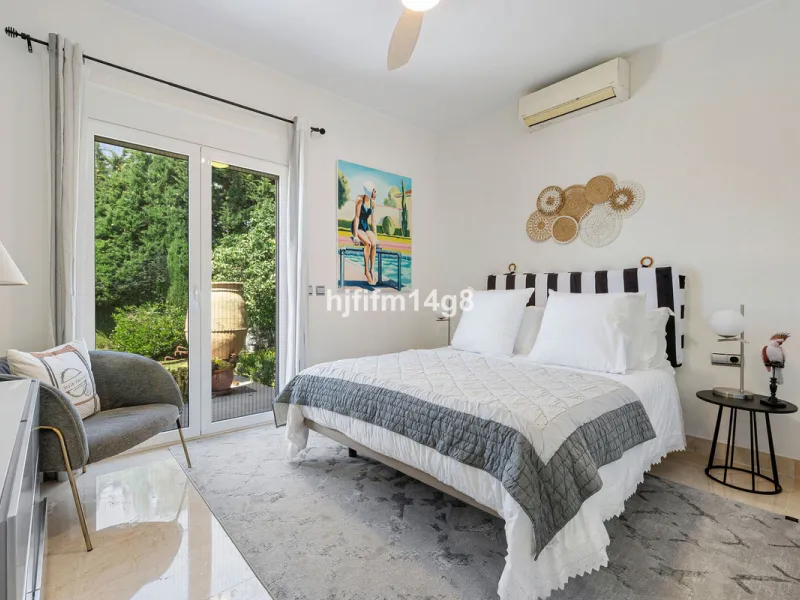 This charming villa is tucked away in a peaceful cul-de-sac within the exclusive gated community of Marbella Country Club, one of Nueva Andalucía's most desirable residential areas. Set on a flat and private south-facing plot, the property offers a perfec