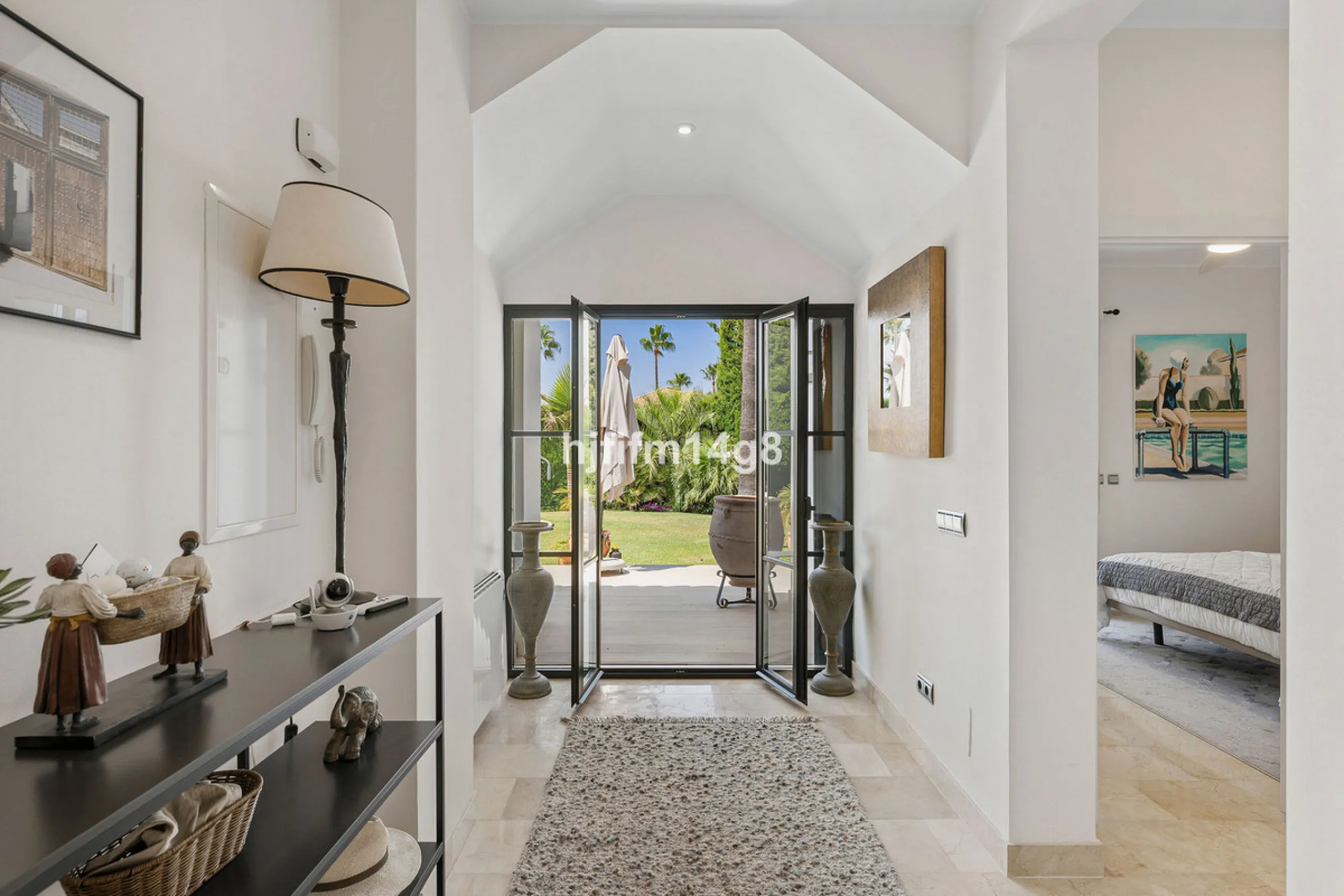 This charming villa is tucked away in a peaceful cul-de-sac within the exclusive gated community of Marbella Country Club, one of Nueva Andalucía's most desirable residential areas. Set on a flat and private south-facing plot, the property offers a perfec