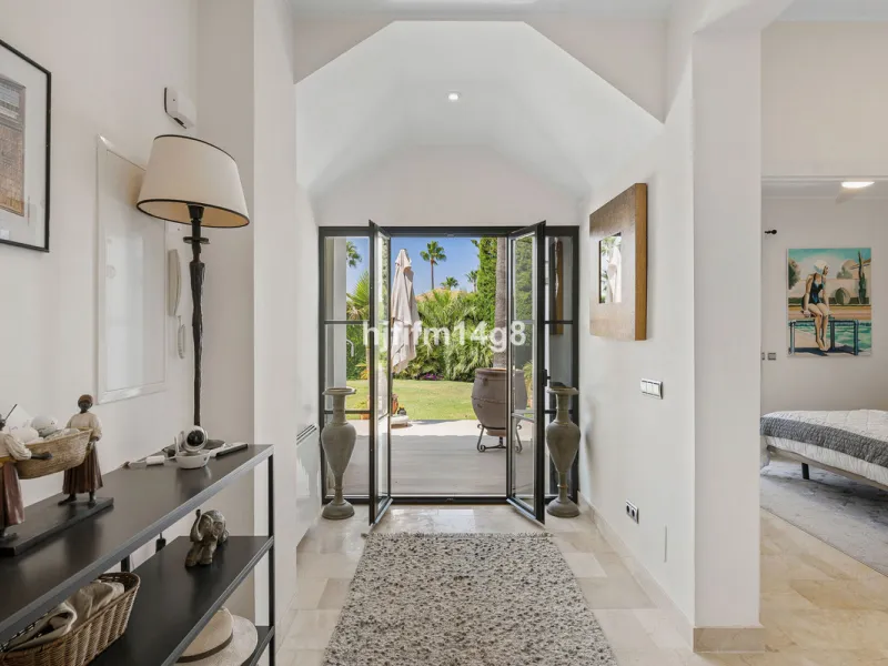 This charming villa is tucked away in a peaceful cul-de-sac within the exclusive gated community of Marbella Country Club, one of Nueva Andalucía's most desirable residential areas. Set on a flat and private south-facing plot, the property offers a perfec