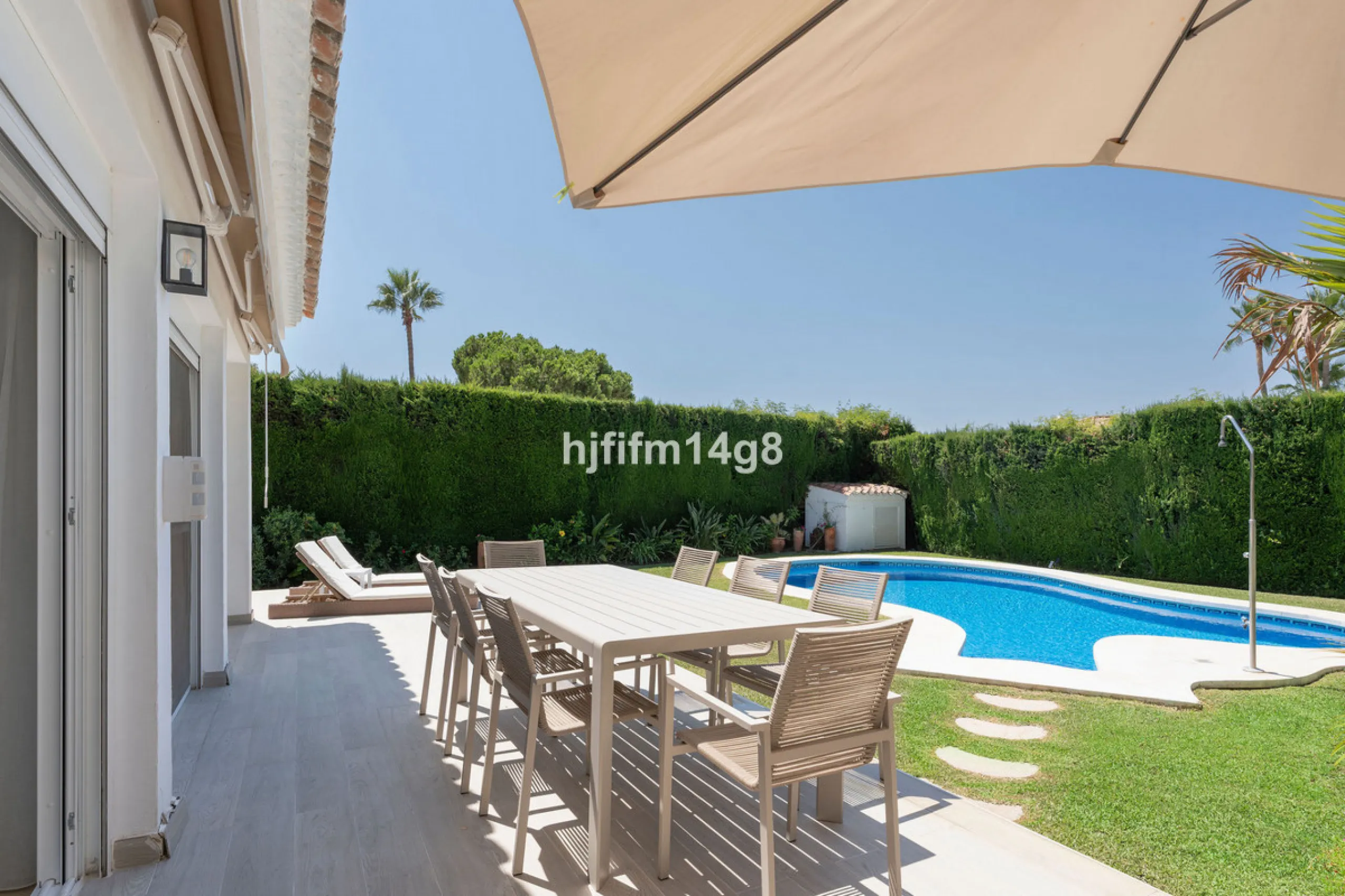 This charming villa is tucked away in a peaceful cul-de-sac within the exclusive gated community of Marbella Country Club, one of Nueva Andalucía's most desirable residential areas. Set on a flat and private south-facing plot, the property offers a perfec