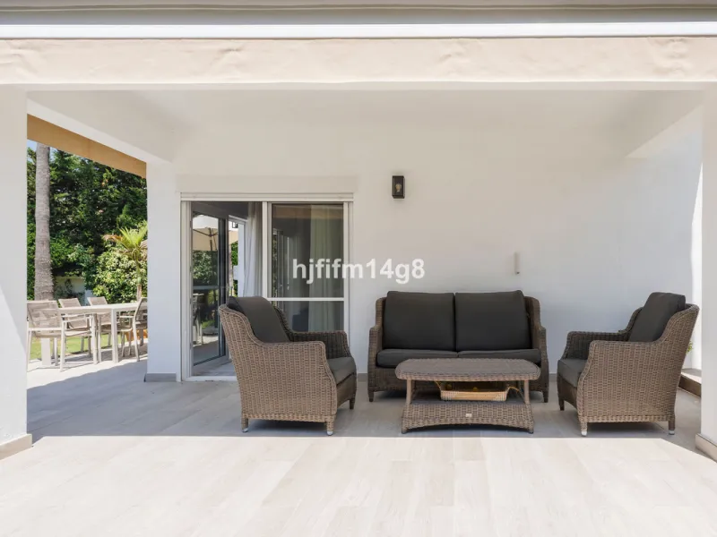 This charming villa is tucked away in a peaceful cul-de-sac within the exclusive gated community of Marbella Country Club, one of Nueva Andalucía's most desirable residential areas. Set on a flat and private south-facing plot, the property offers a perfec