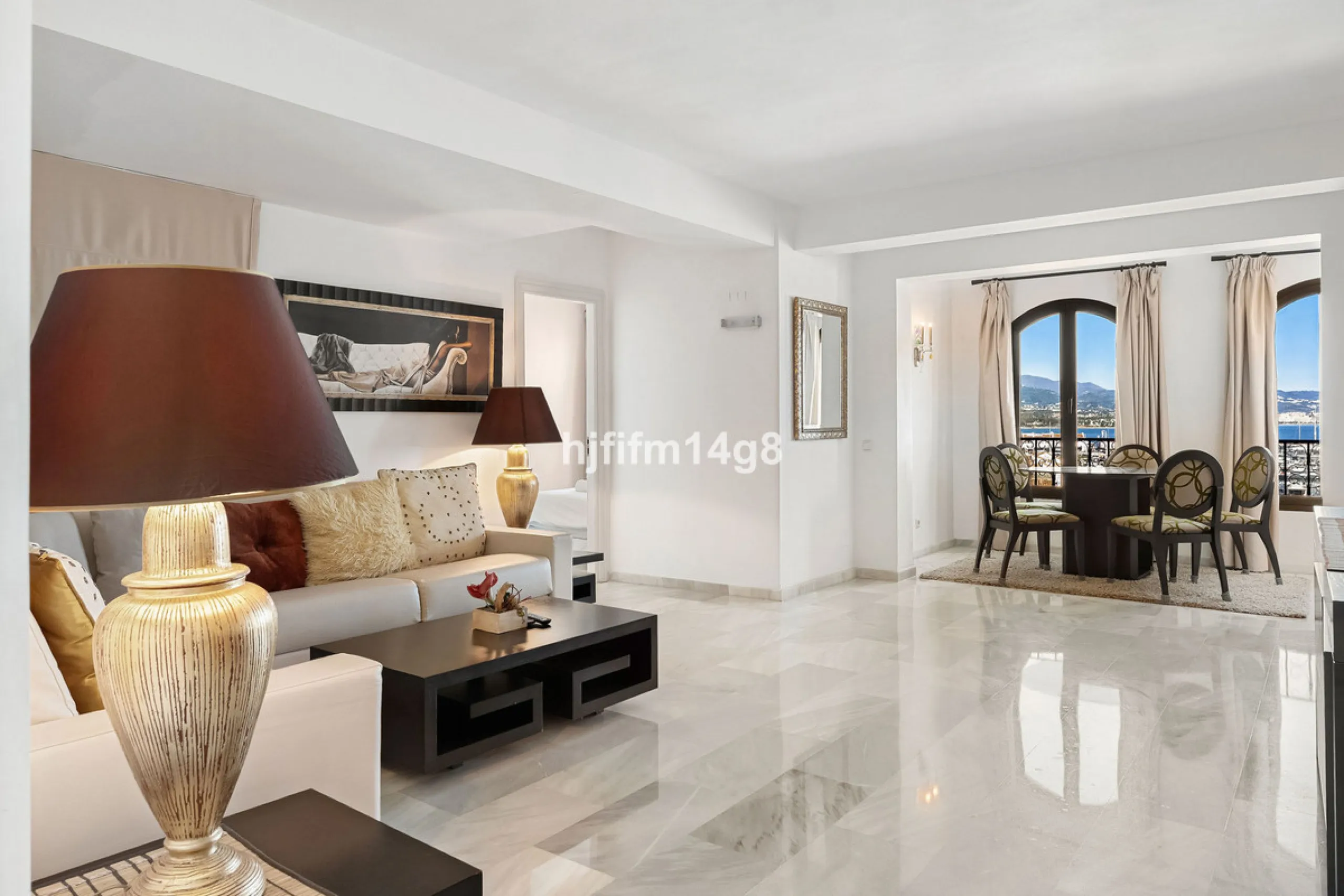 This spacious apartment for sale in Benabola, Puerto Banús offers a rare opportunity to invest in one of Marbella's most prestigious marina-front locations. Situated in second line, the property enjoys front-line marina views while benefiting from the gre