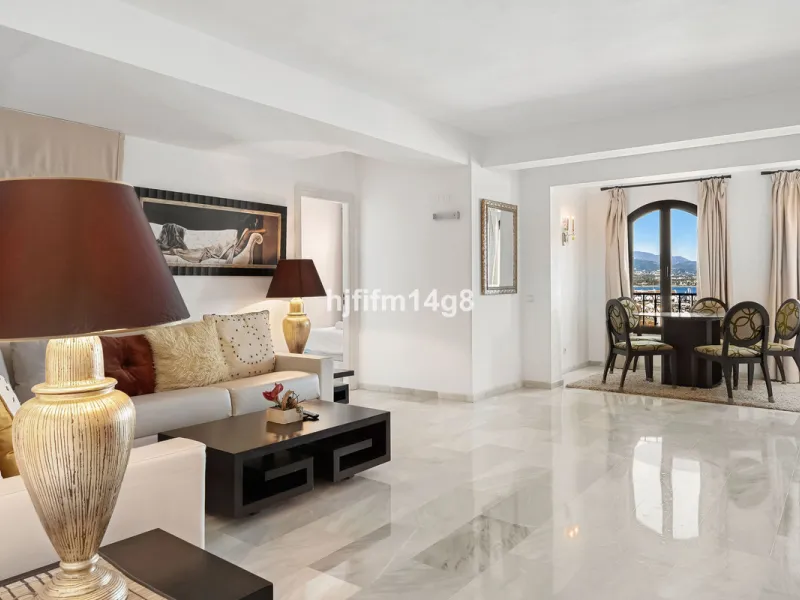 This spacious apartment for sale in Benabola, Puerto Banús offers a rare opportunity to invest in one of Marbella's most prestigious marina-front locations. Situated in second line, the property enjoys front-line marina views while benefiting from the gre