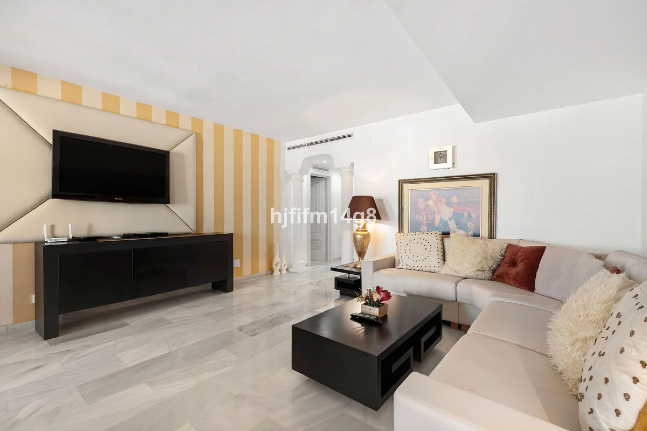 This spacious apartment for sale in Benabola, Puerto Banús offers a rare opportunity to invest in one of Marbella's most prestigious marina-front locations. Situated in second line, the property enjoys front-line marina views while benefiting from the gre