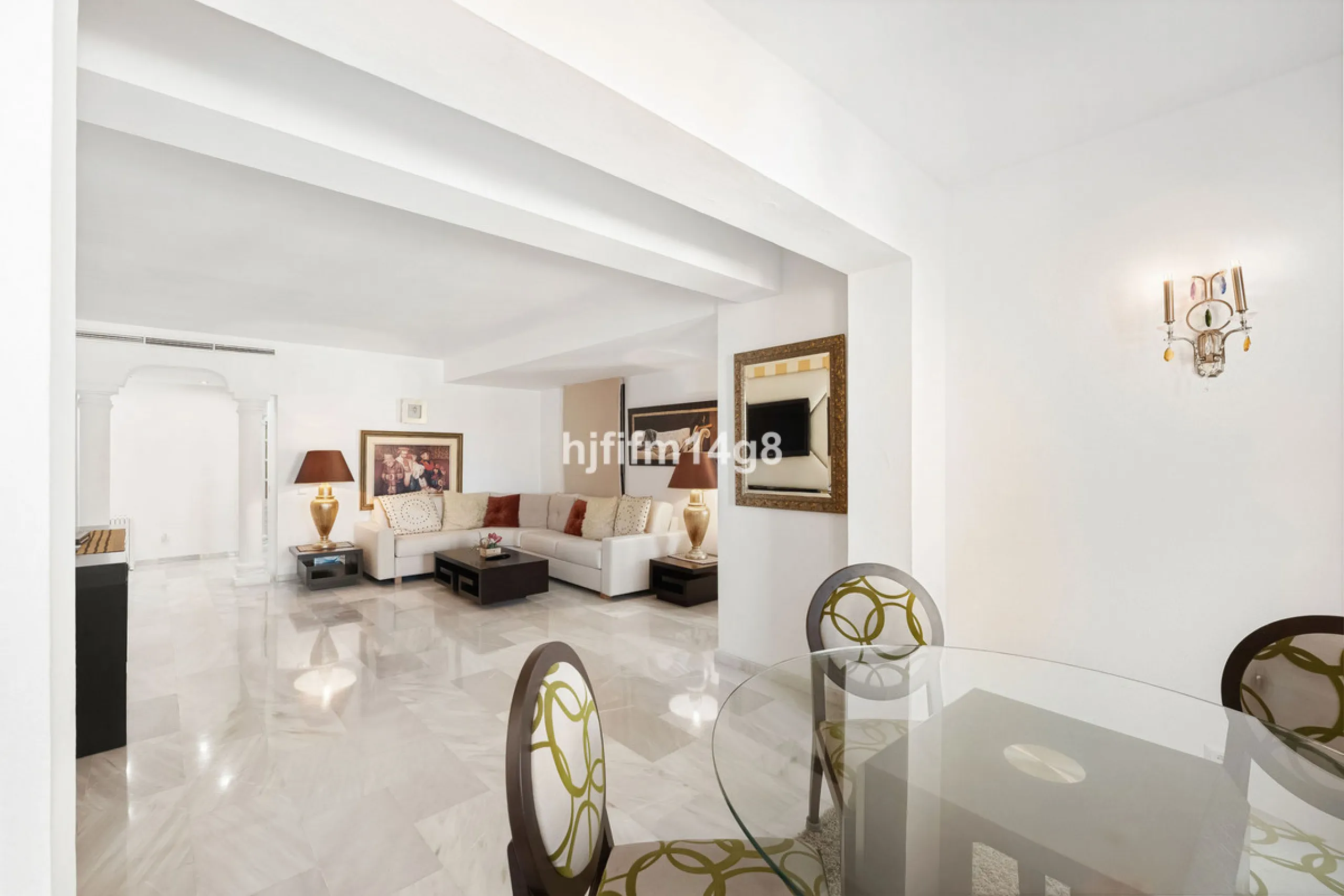 This spacious apartment for sale in Benabola, Puerto Banús offers a rare opportunity to invest in one of Marbella's most prestigious marina-front locations. Situated in second line, the property enjoys front-line marina views while benefiting from the gre