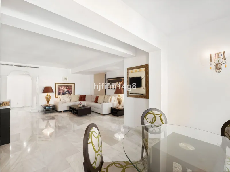 This spacious apartment for sale in Benabola, Puerto Banús offers a rare opportunity to invest in one of Marbella's most prestigious marina-front locations. Situated in second line, the property enjoys front-line marina views while benefiting from the gre