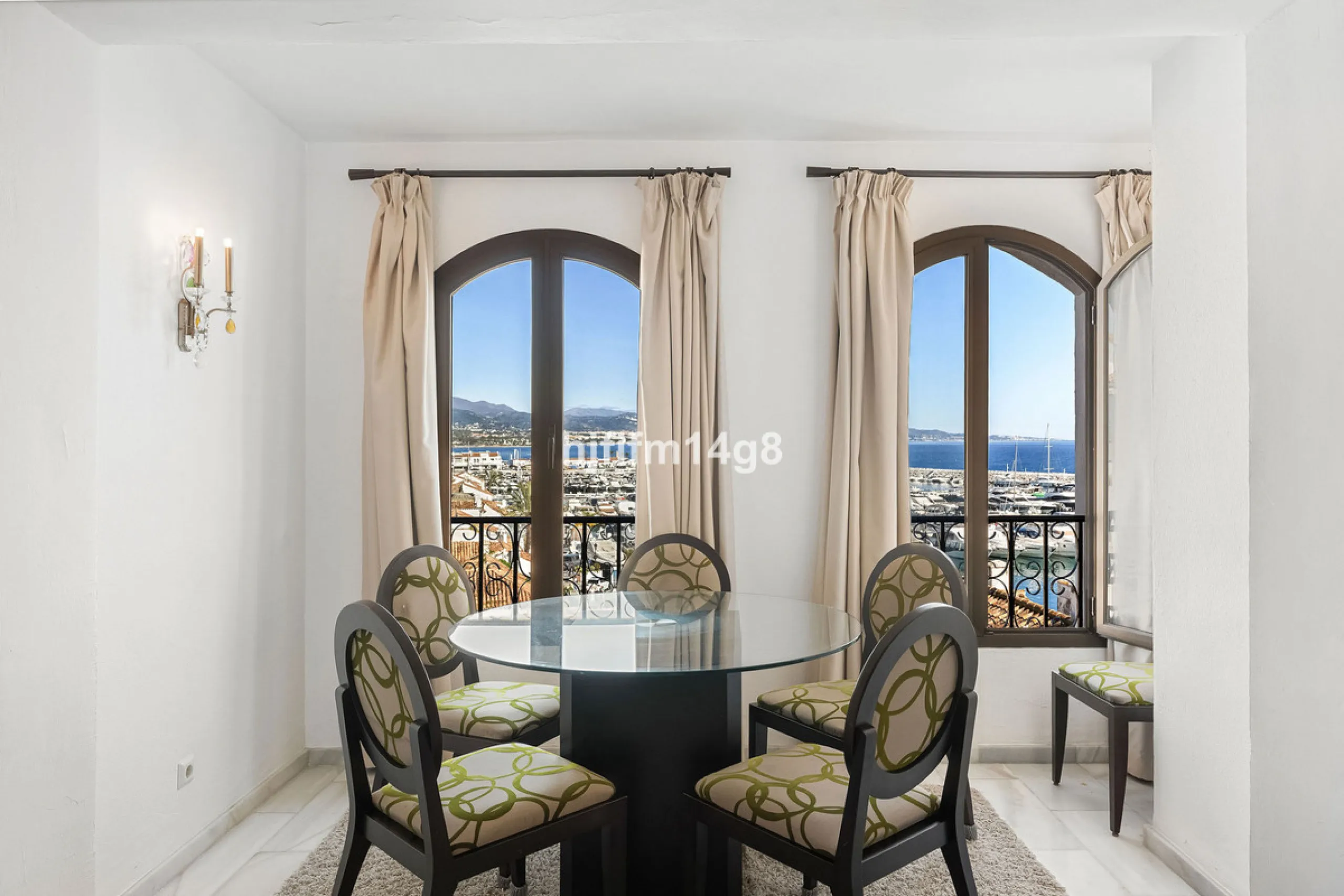 This spacious apartment for sale in Benabola, Puerto Banús offers a rare opportunity to invest in one of Marbella's most prestigious marina-front locations. Situated in second line, the property enjoys front-line marina views while benefiting from the gre