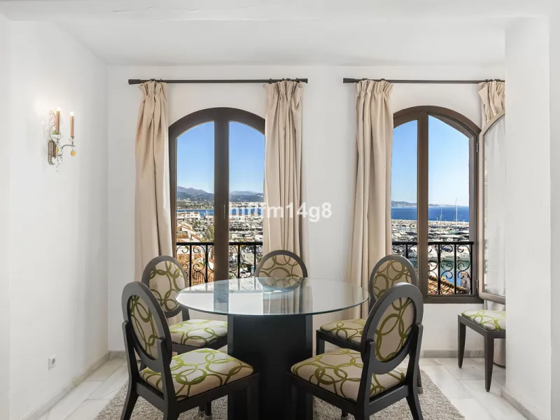This spacious apartment for sale in Benabola, Puerto Banús offers a rare opportunity to invest in one of Marbella's most prestigious marina-front locations. Situated in second line, the property enjoys front-line marina views while benefiting from the gre