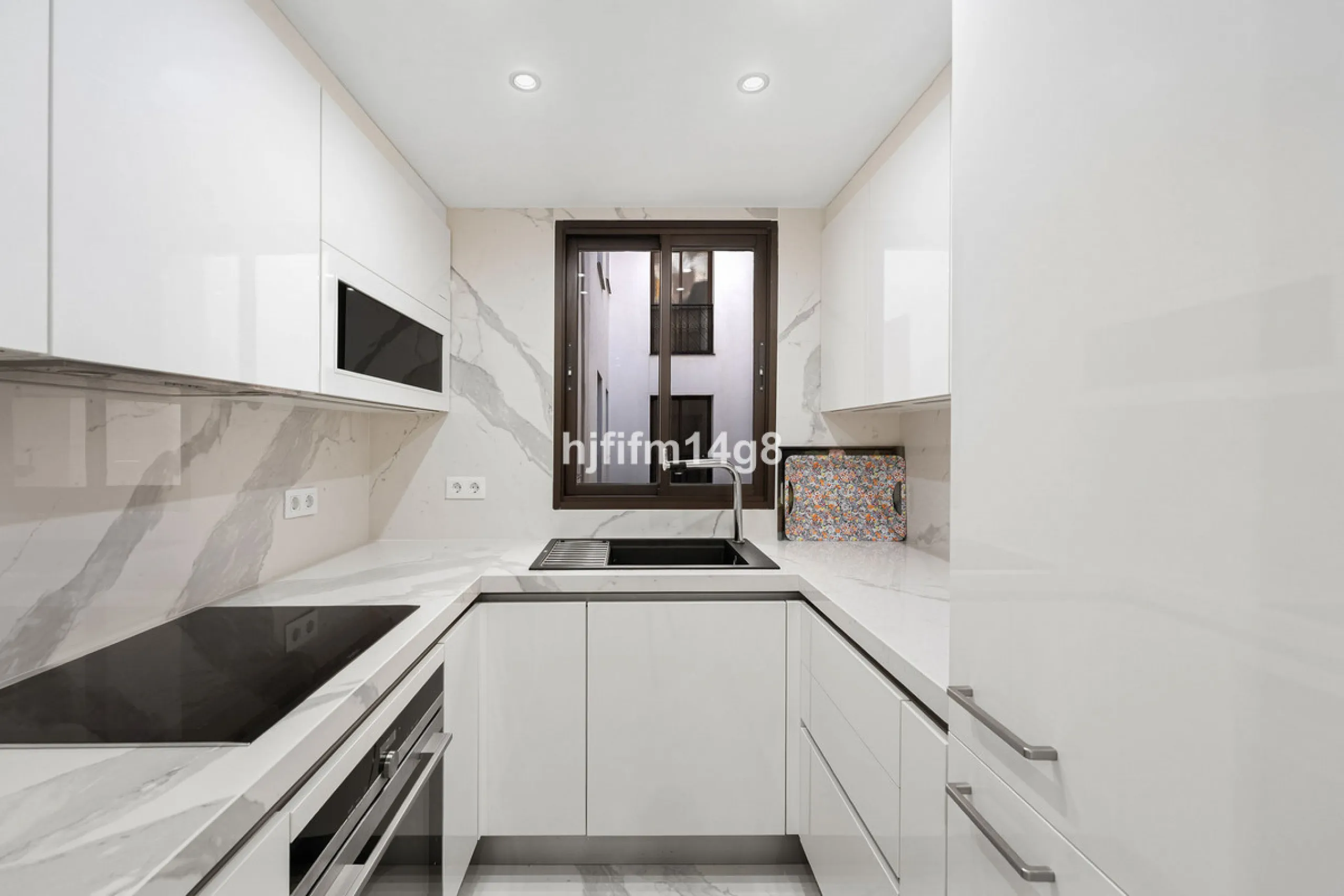 This spacious apartment for sale in Benabola, Puerto Banús offers a rare opportunity to invest in one of Marbella's most prestigious marina-front locations. Situated in second line, the property enjoys front-line marina views while benefiting from the gre