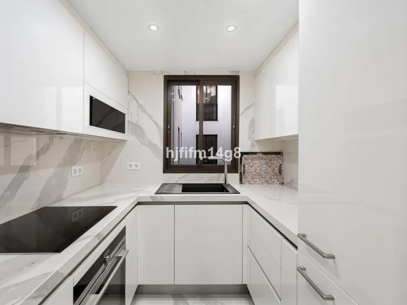 This spacious apartment for sale in Benabola, Puerto Banús offers a rare opportunity to invest in one of Marbella's most prestigious marina-front locations. Situated in second line, the property enjoys front-line marina views while benefiting from the gre