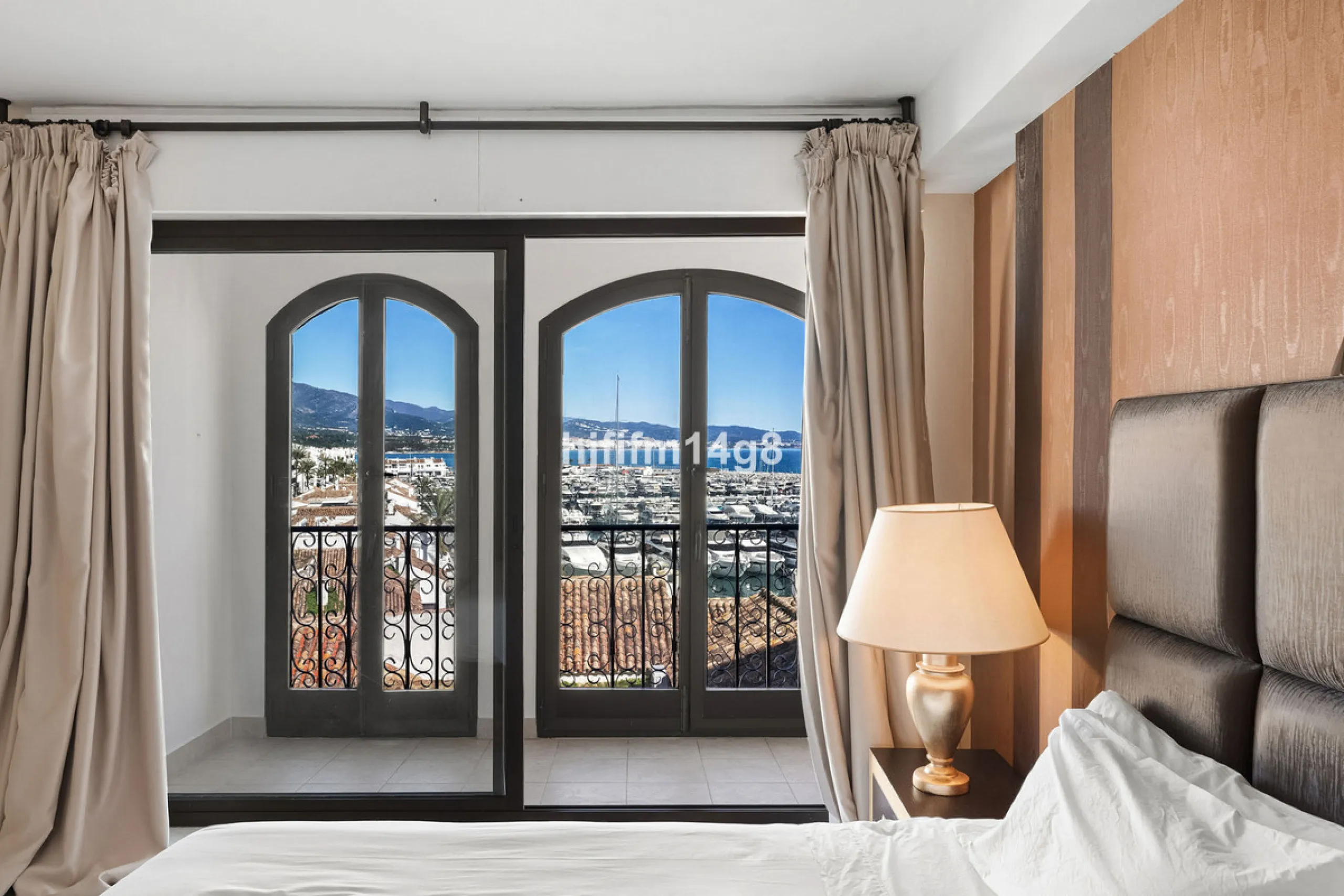 This spacious apartment for sale in Benabola, Puerto Banús offers a rare opportunity to invest in one of Marbella's most prestigious marina-front locations. Situated in second line, the property enjoys front-line marina views while benefiting from the gre