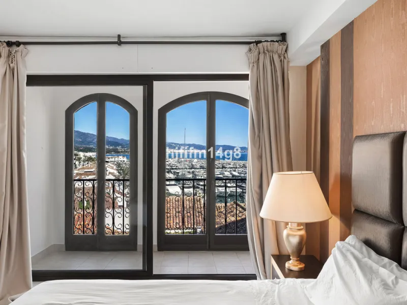 This spacious apartment for sale in Benabola, Puerto Banús offers a rare opportunity to invest in one of Marbella's most prestigious marina-front locations. Situated in second line, the property enjoys front-line marina views while benefiting from the gre