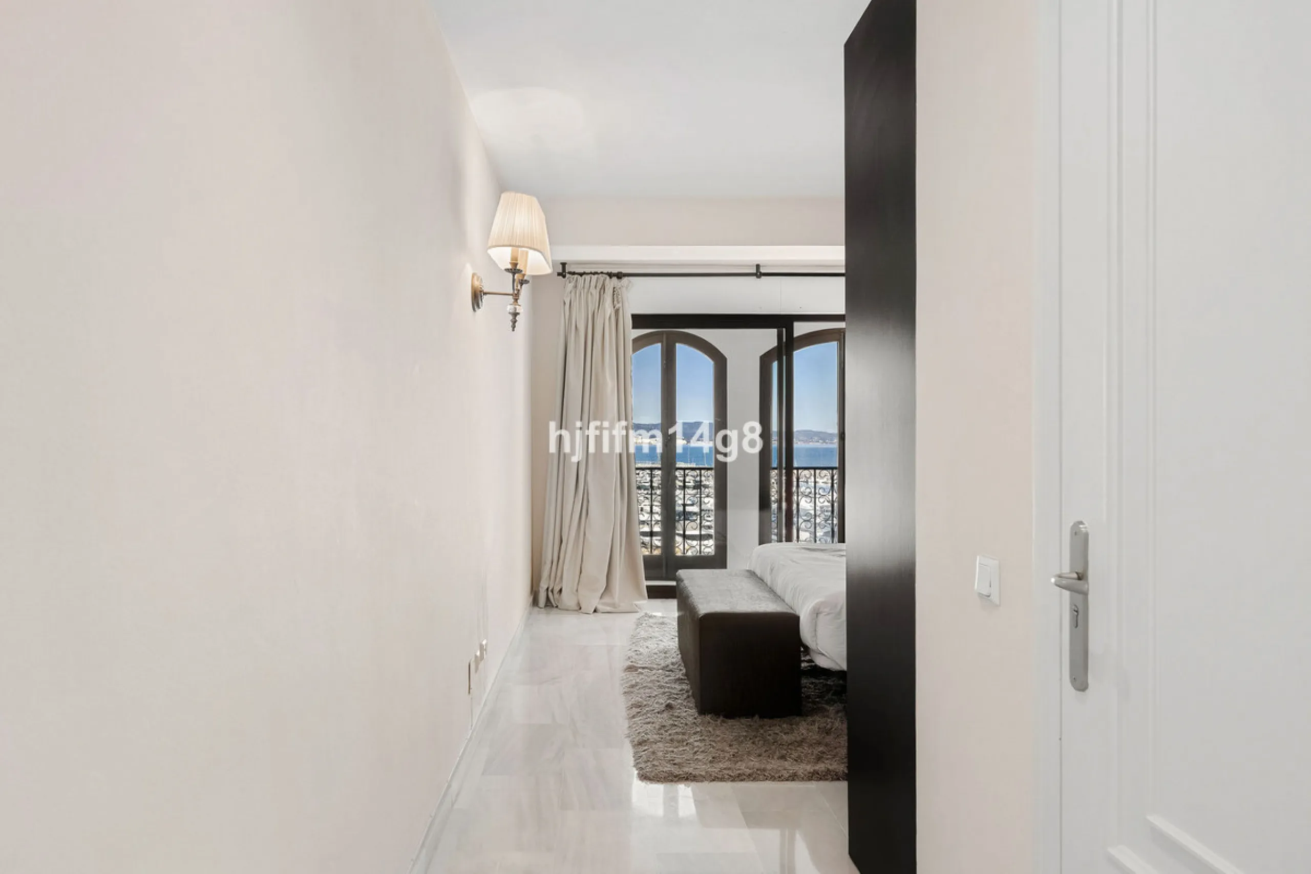 This spacious apartment for sale in Benabola, Puerto Banús offers a rare opportunity to invest in one of Marbella's most prestigious marina-front locations. Situated in second line, the property enjoys front-line marina views while benefiting from the gre