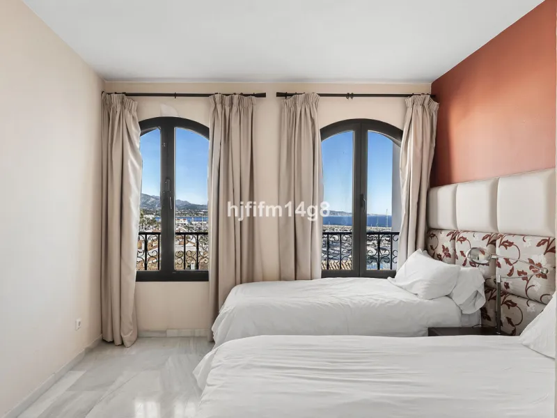 This spacious apartment for sale in Benabola, Puerto Banús offers a rare opportunity to invest in one of Marbella's most prestigious marina-front locations. Situated in second line, the property enjoys front-line marina views while benefiting from the gre
