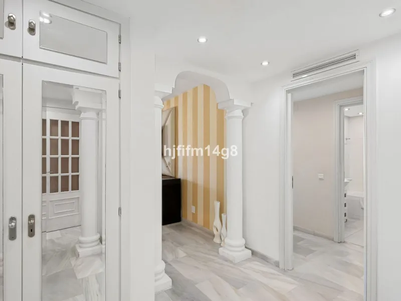 This spacious apartment for sale in Benabola, Puerto Banús offers a rare opportunity to invest in one of Marbella's most prestigious marina-front locations. Situated in second line, the property enjoys front-line marina views while benefiting from the gre