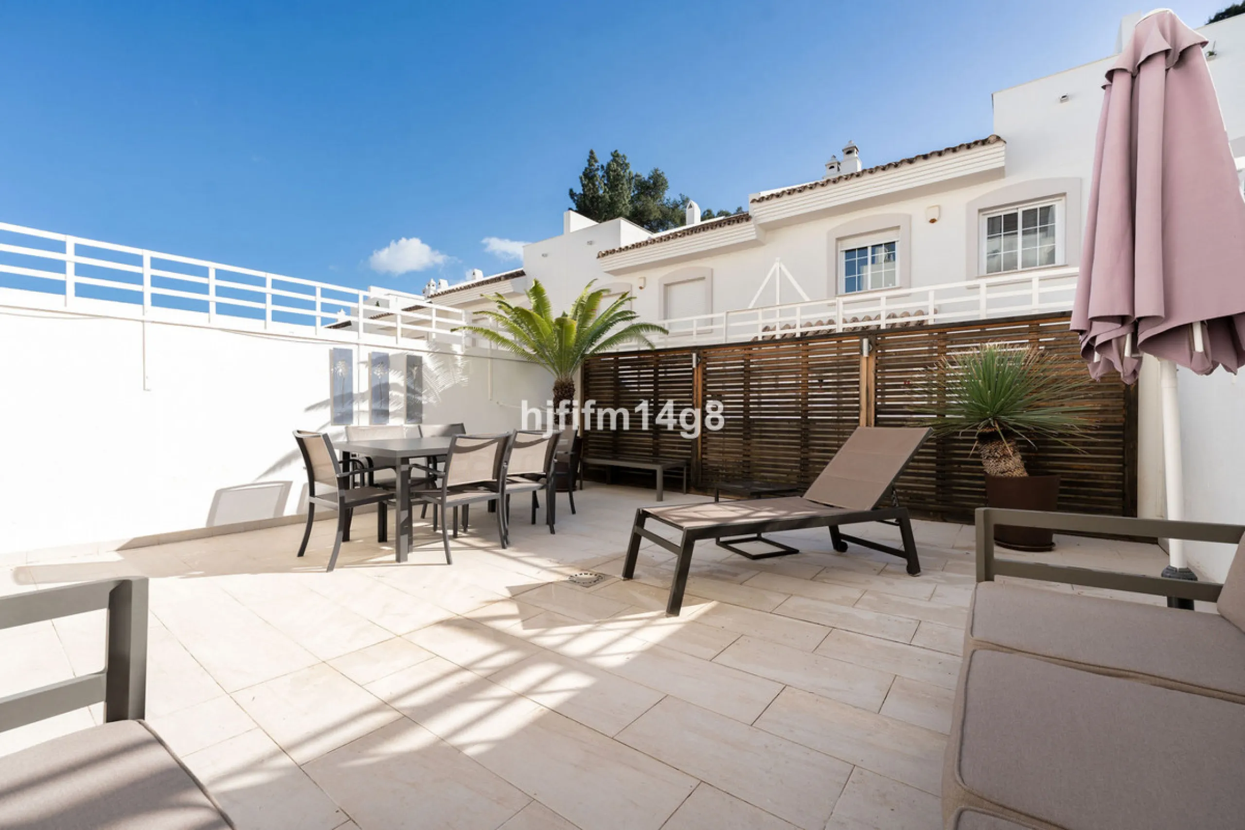 This stunning 3-bedroom townhouse is for sale in the highly sought-after El Alcornoque urbanisation in Nueva Andalucía, one of Marbella's most prestigious areas. Nestled front line to the renowned Aloha Golf Course, this exclusive development of just 22 u