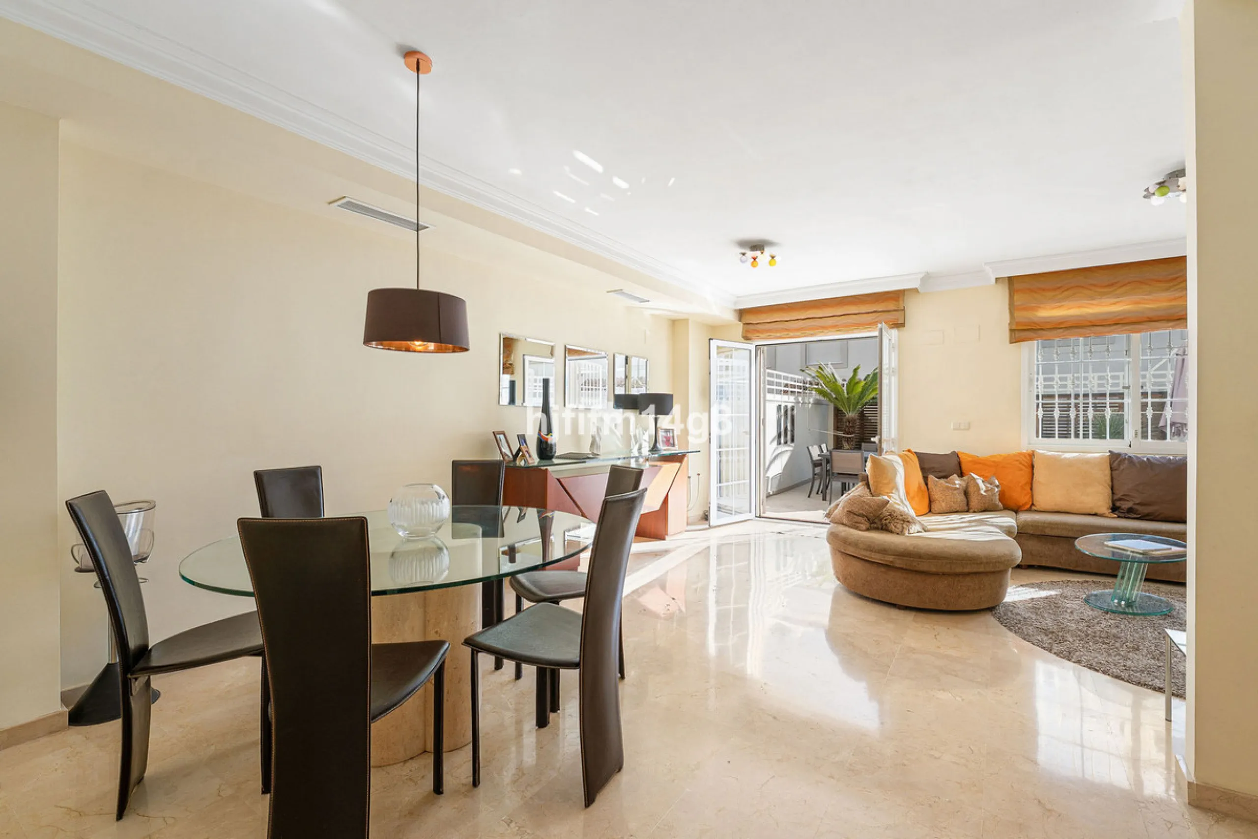 This stunning 3-bedroom townhouse is for sale in the highly sought-after El Alcornoque urbanisation in Nueva Andalucía, one of Marbella's most prestigious areas. Nestled front line to the renowned Aloha Golf Course, this exclusive development of just 22 u