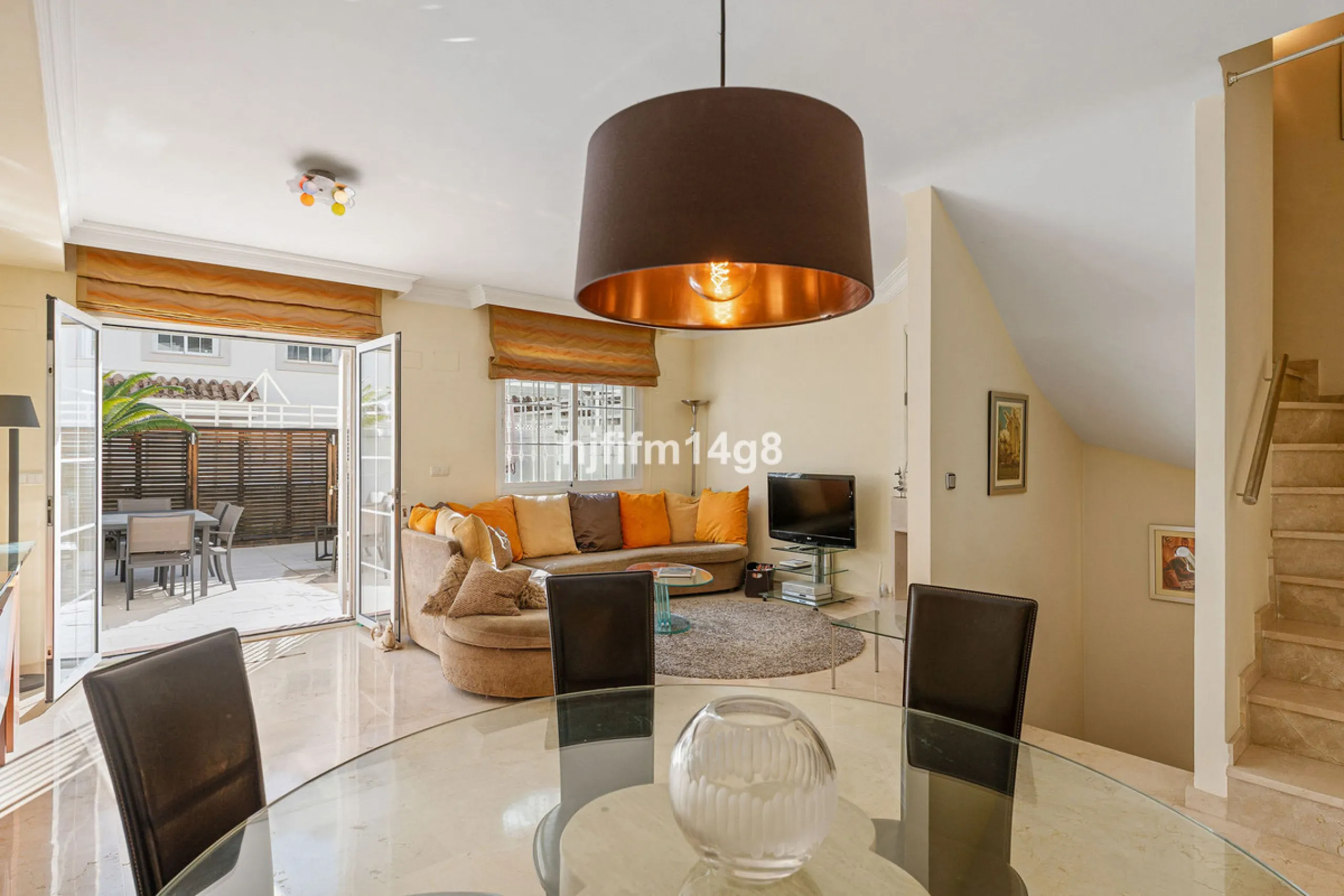 This stunning 3-bedroom townhouse is for sale in the highly sought-after El Alcornoque urbanisation in Nueva Andalucía, one of Marbella's most prestigious areas. Nestled front line to the renowned Aloha Golf Course, this exclusive development of just 22 u