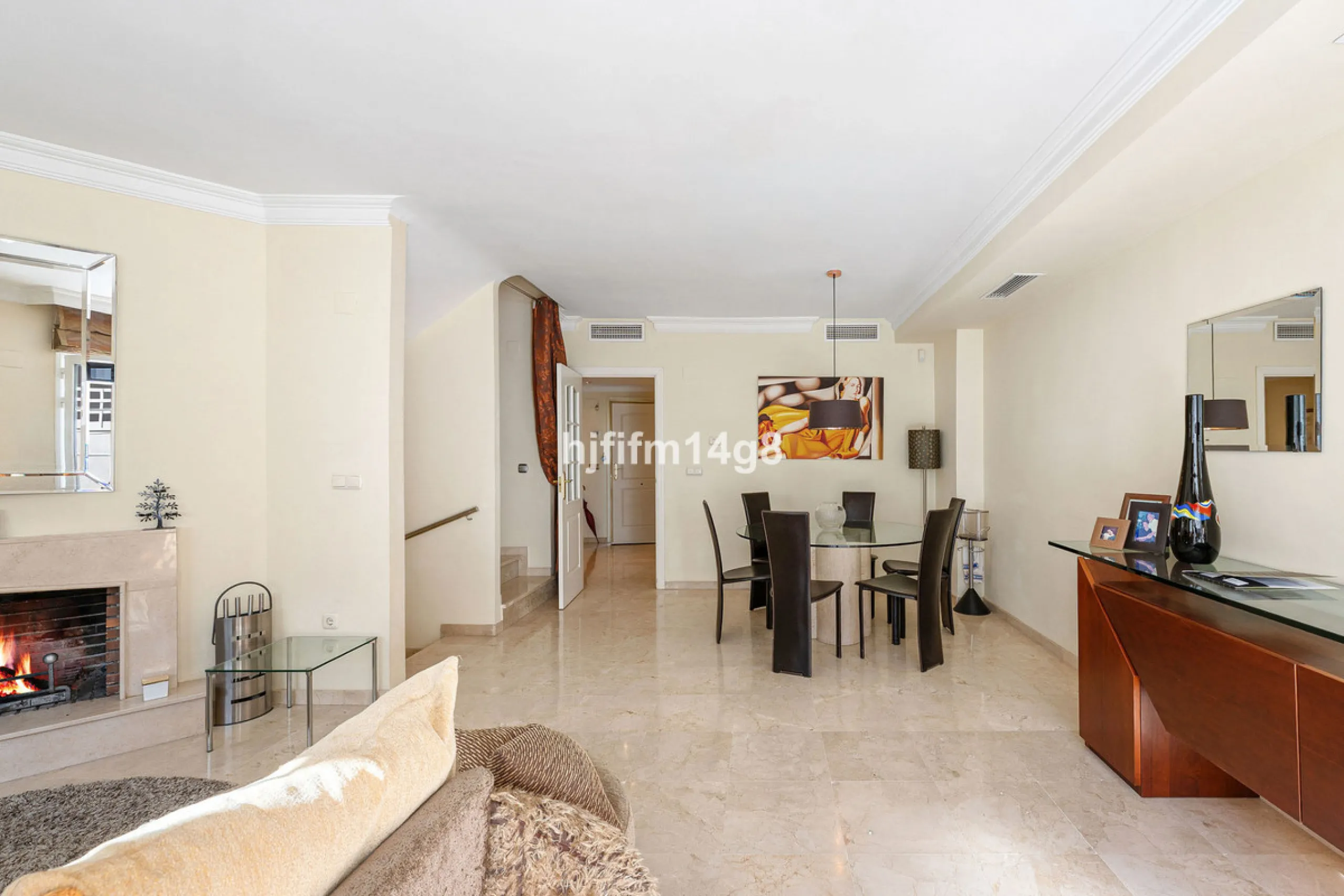 This stunning 3-bedroom townhouse is for sale in the highly sought-after El Alcornoque urbanisation in Nueva Andalucía, one of Marbella's most prestigious areas. Nestled front line to the renowned Aloha Golf Course, this exclusive development of just 22 u