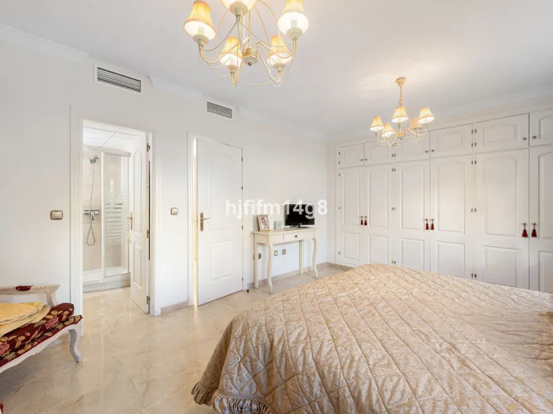 This stunning 3-bedroom townhouse is for sale in the highly sought-after El Alcornoque urbanisation in Nueva Andalucía, one of Marbella's most prestigious areas. Nestled front line to the renowned Aloha Golf Course, this exclusive development of just 22 u