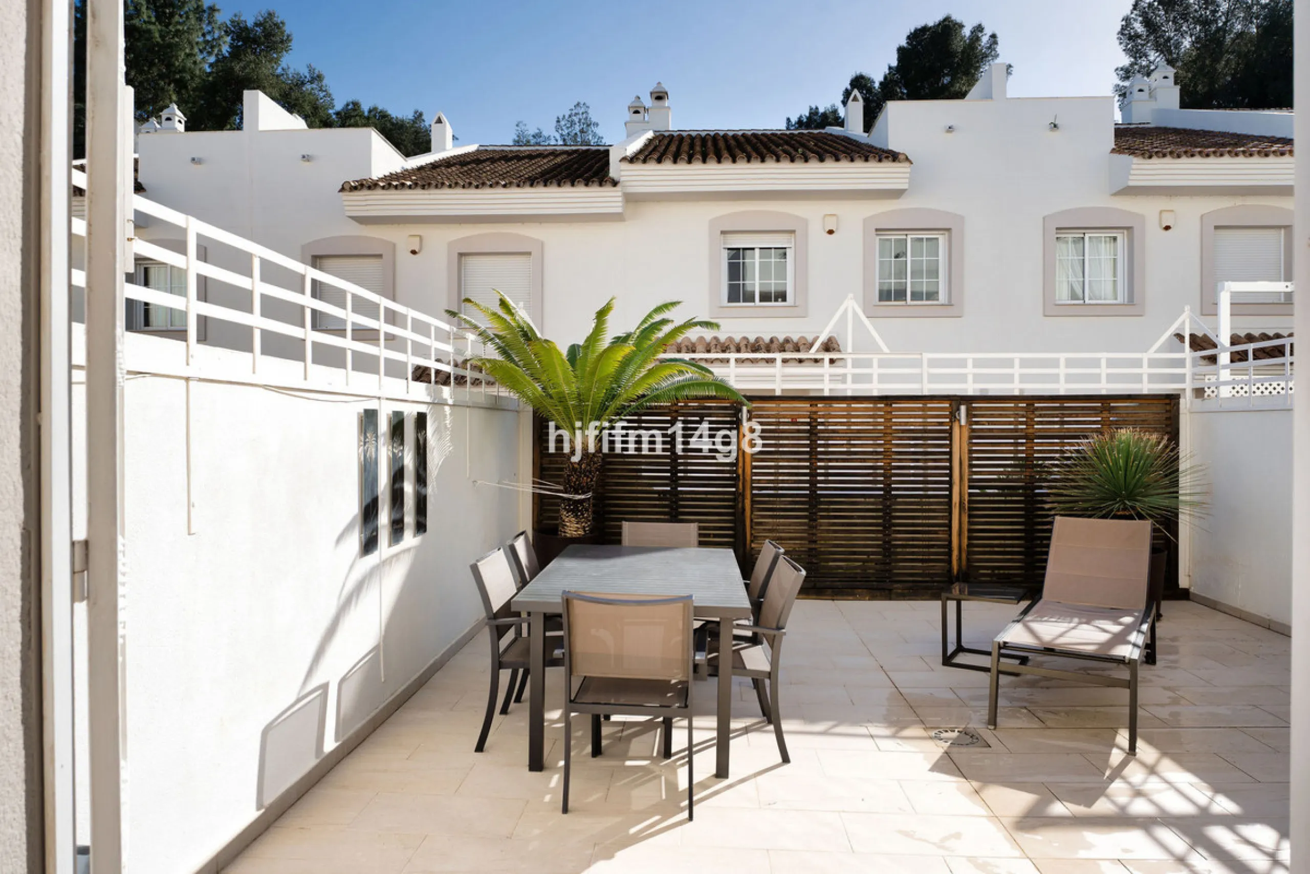 This stunning 3-bedroom townhouse is for sale in the highly sought-after El Alcornoque urbanisation in Nueva Andalucía, one of Marbella's most prestigious areas. Nestled front line to the renowned Aloha Golf Course, this exclusive development of just 22 u