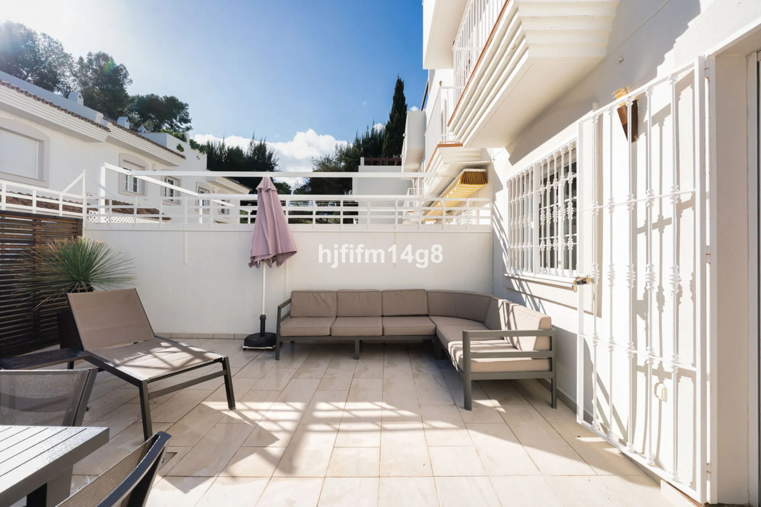 This stunning 3-bedroom townhouse is for sale in the highly sought-after El Alcornoque urbanisation in Nueva Andalucía, one of Marbella's most prestigious areas. Nestled front line to the renowned Aloha Golf Course, this exclusive development of just 22 u