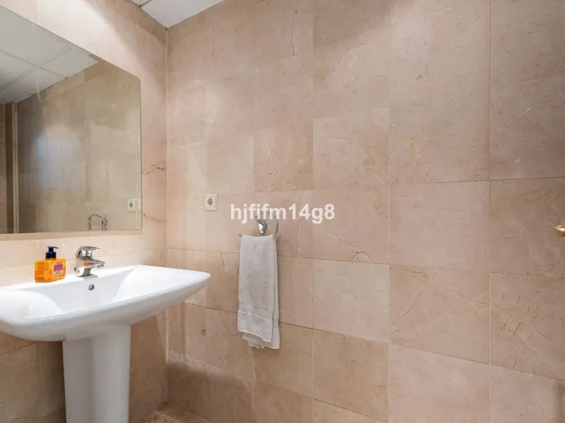 This stunning 3-bedroom townhouse is for sale in the highly sought-after El Alcornoque urbanisation in Nueva Andalucía, one of Marbella's most prestigious areas. Nestled front line to the renowned Aloha Golf Course, this exclusive development of just 22 u