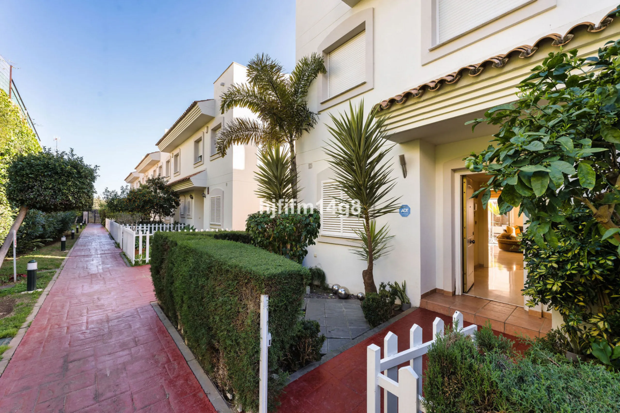 This stunning 3-bedroom townhouse is for sale in the highly sought-after El Alcornoque urbanisation in Nueva Andalucía, one of Marbella's most prestigious areas. Nestled front line to the renowned Aloha Golf Course, this exclusive development of just 22 u
