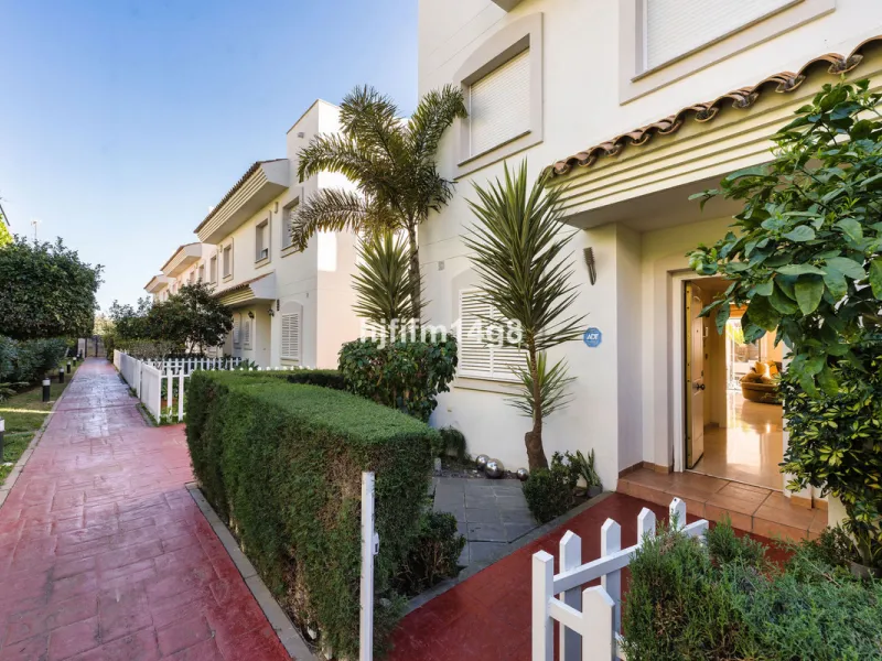 This stunning 3-bedroom townhouse is for sale in the highly sought-after El Alcornoque urbanisation in Nueva Andalucía, one of Marbella's most prestigious areas. Nestled front line to the renowned Aloha Golf Course, this exclusive development of just 22 u