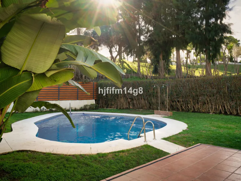 This stunning 3-bedroom townhouse is for sale in the highly sought-after El Alcornoque urbanisation in Nueva Andalucía, one of Marbella's most prestigious areas. Nestled front line to the renowned Aloha Golf Course, this exclusive development of just 22 u