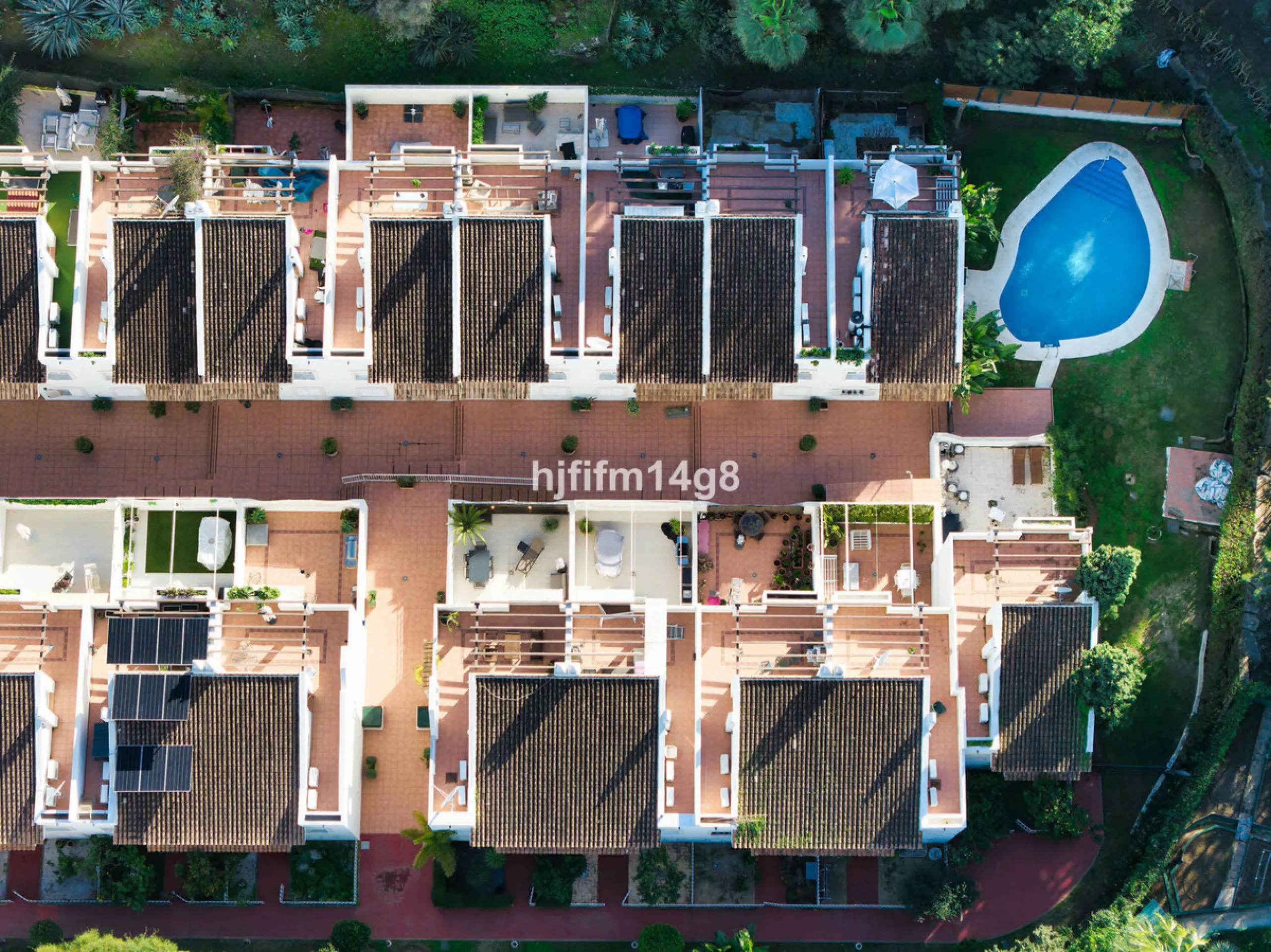 This stunning 3-bedroom townhouse is for sale in the highly sought-after El Alcornoque urbanisation in Nueva Andalucía, one of Marbella's most prestigious areas. Nestled front line to the renowned Aloha Golf Course, this exclusive development of just 22 u