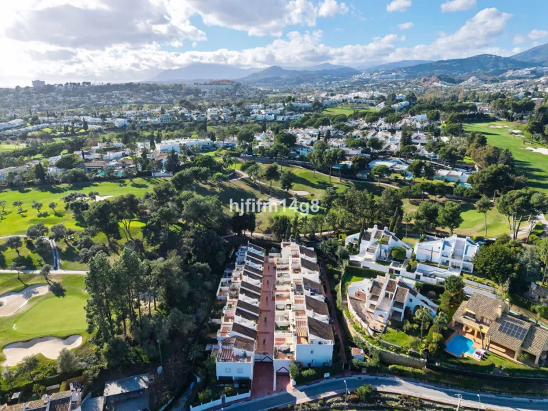 This stunning 3-bedroom townhouse is for sale in the highly sought-after El Alcornoque urbanisation in Nueva Andalucía, one of Marbella's most prestigious areas. Nestled front line to the renowned Aloha Golf Course, this exclusive development of just 22 u