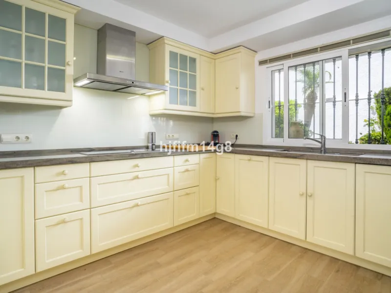 Discover this rare opportunity to own a charming townhouse for sale in Los Altos de Aloha, one of the most desirable residential complexes in Nueva Andalucía, Marbella. Perfectly positioned frontline to the pool, this beautifully maintained property offer
