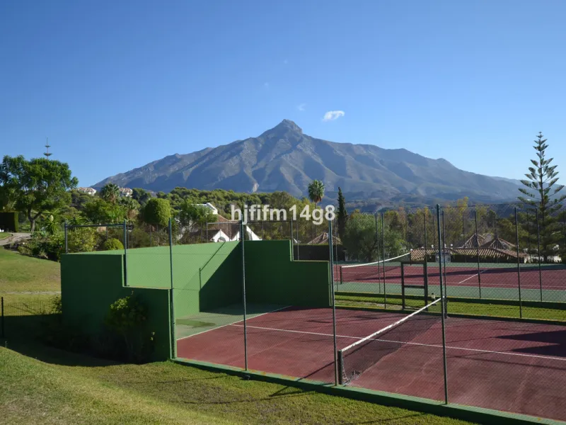 Discover this rare opportunity to own a charming townhouse for sale in Los Altos de Aloha, one of the most desirable residential complexes in Nueva Andalucía, Marbella. Perfectly positioned frontline to the pool, this beautifully maintained property offer